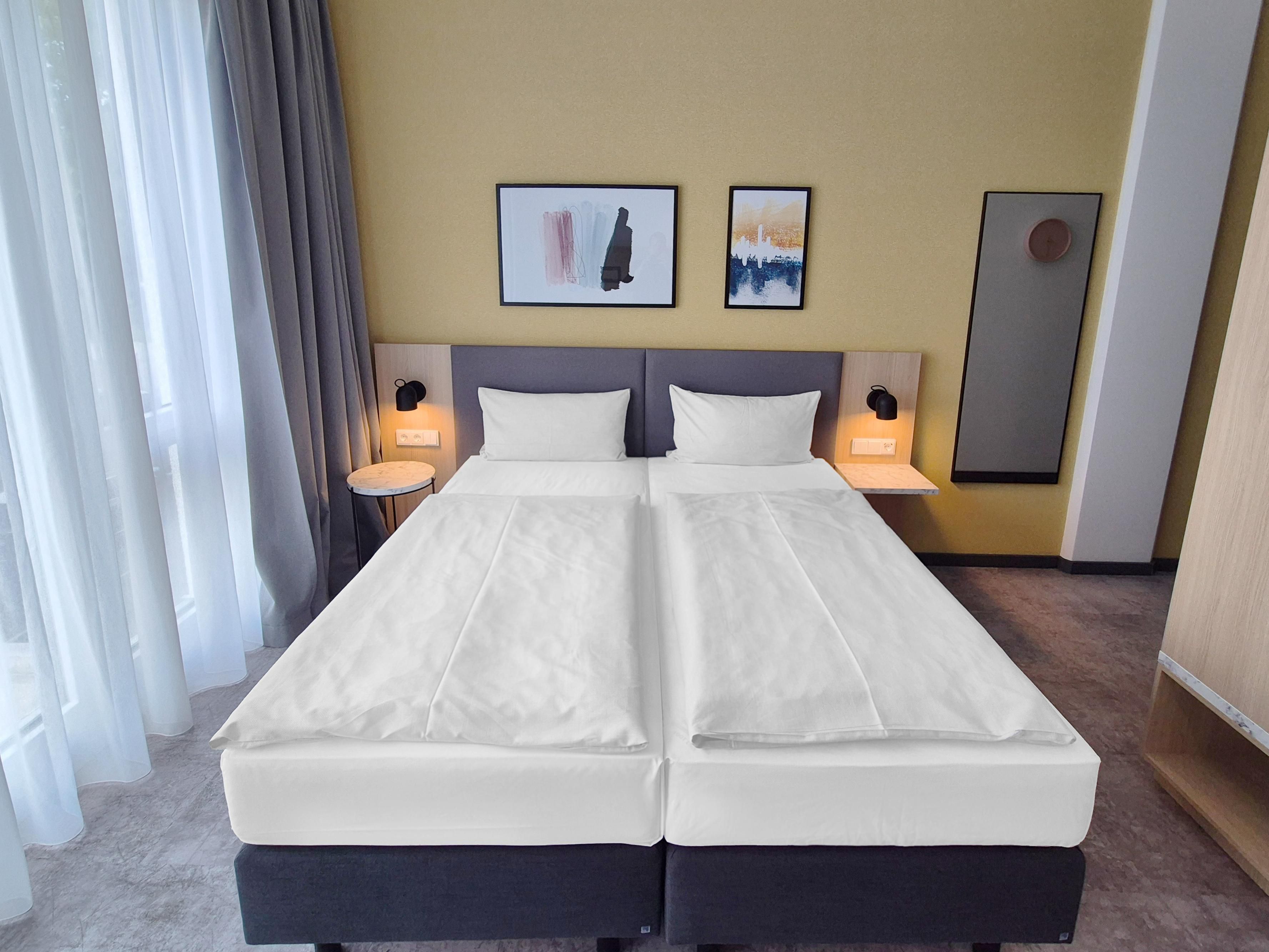 Reposez-vous dans les lits confortables du Candlewood Suites Berlin Airport