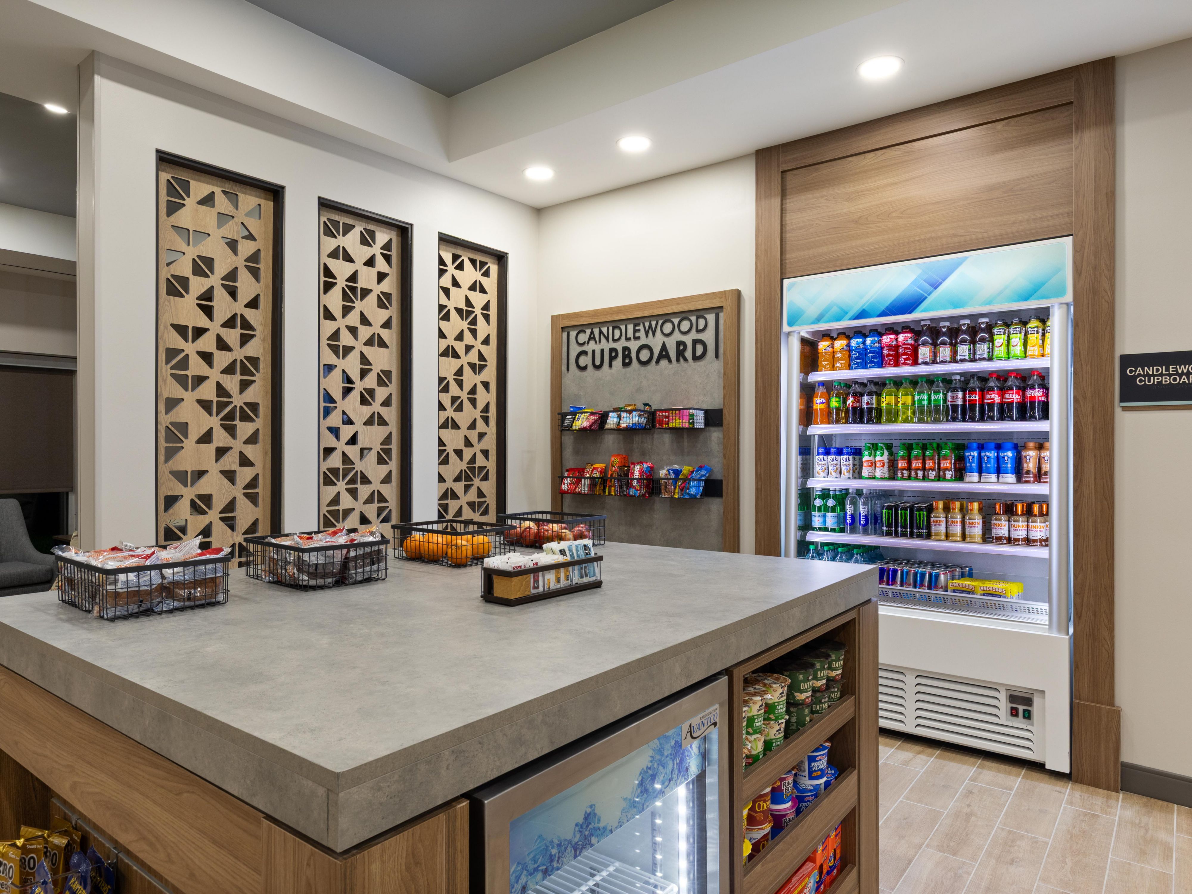 Food basics are available in our Candlewood Cupboard located in the lobby for you to stock up on easy-to-prepare meals and snacks for your room. Each suite has a full-size refrigerator for you to store your goods.
