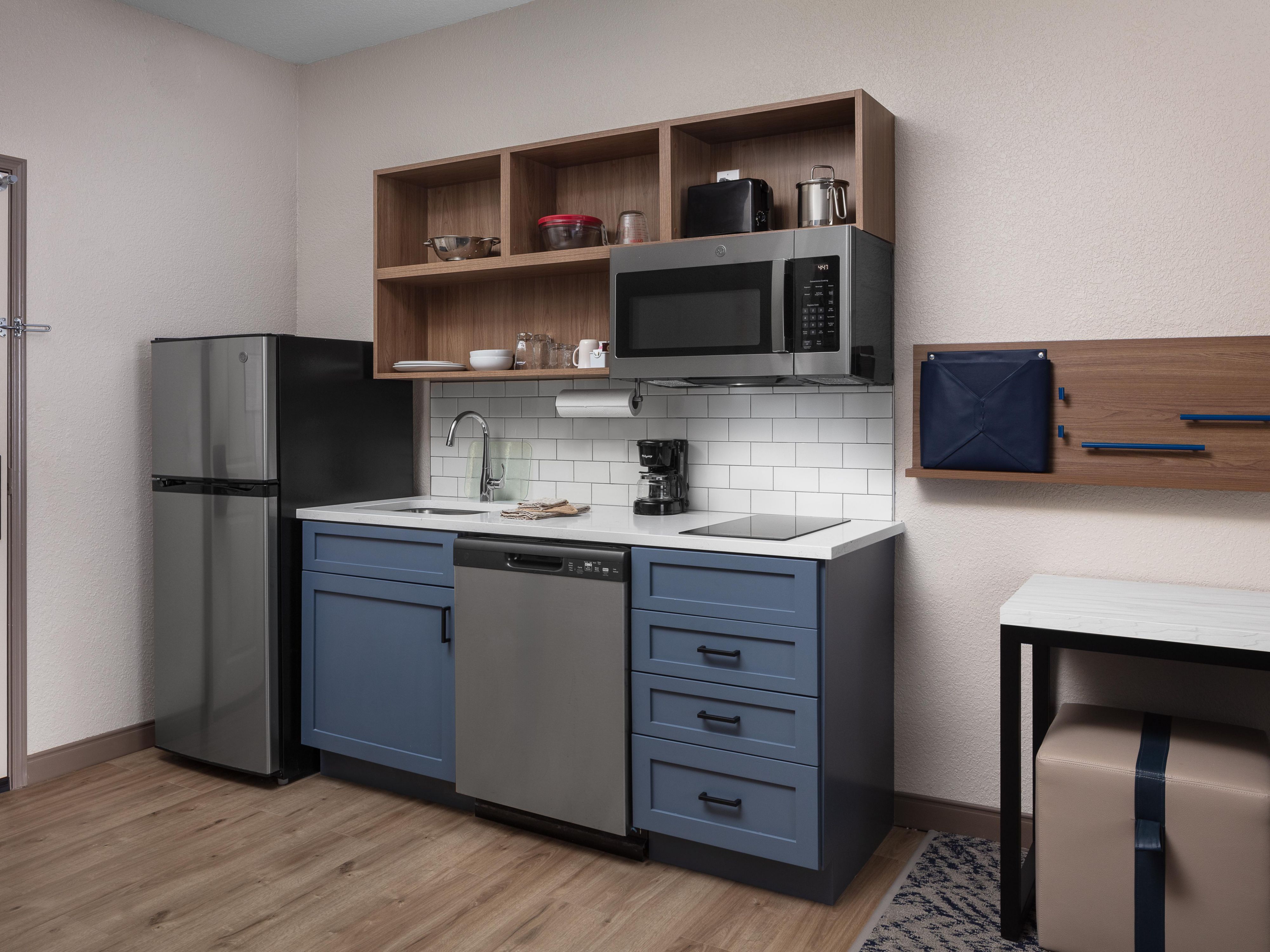 In-Room Kitchenette – Cook with a full fridge and cookware