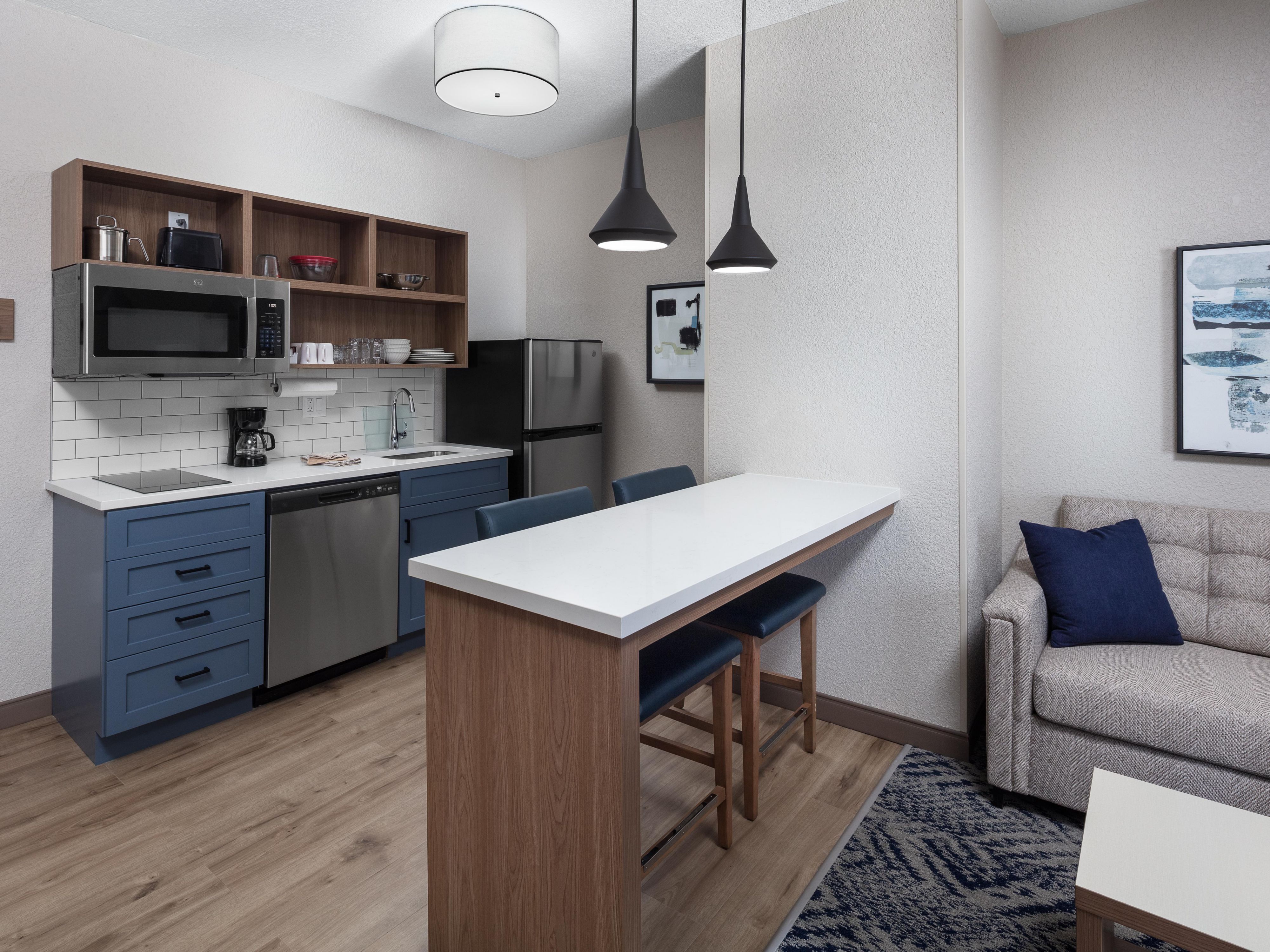 Our most popular choice for long-term stays, the one-bedroom suite, offers apartment-style living with everything included. Enjoy a separate bedroom with a queen bed, private bathroom, and TV, plus a living area with a sofa bed, TV, kitchenette, table, and closet space. Perfect for extended stays with all the comforts of home!