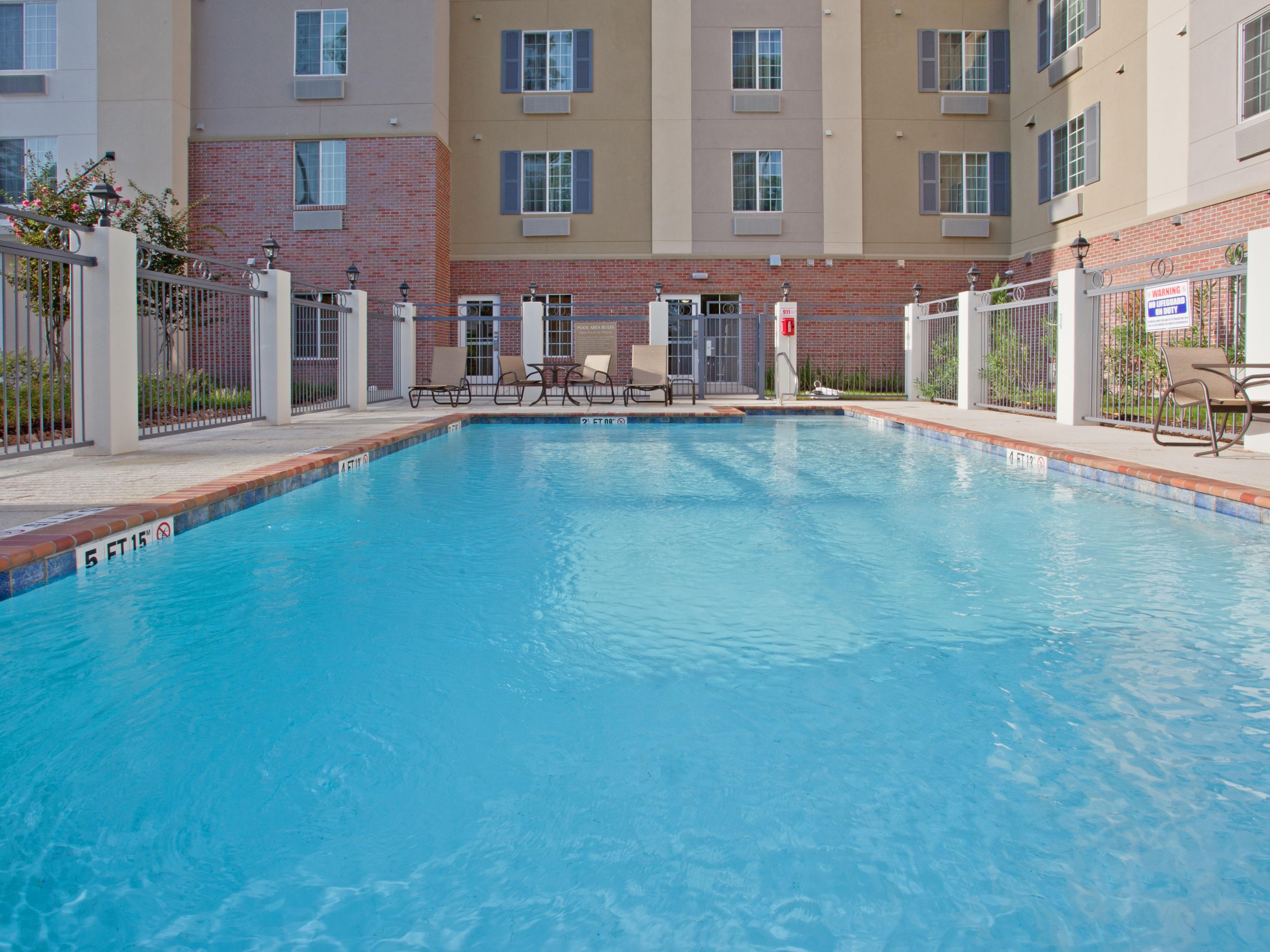 Relax in our sparkling pool--Texas weather lets you do so longer.