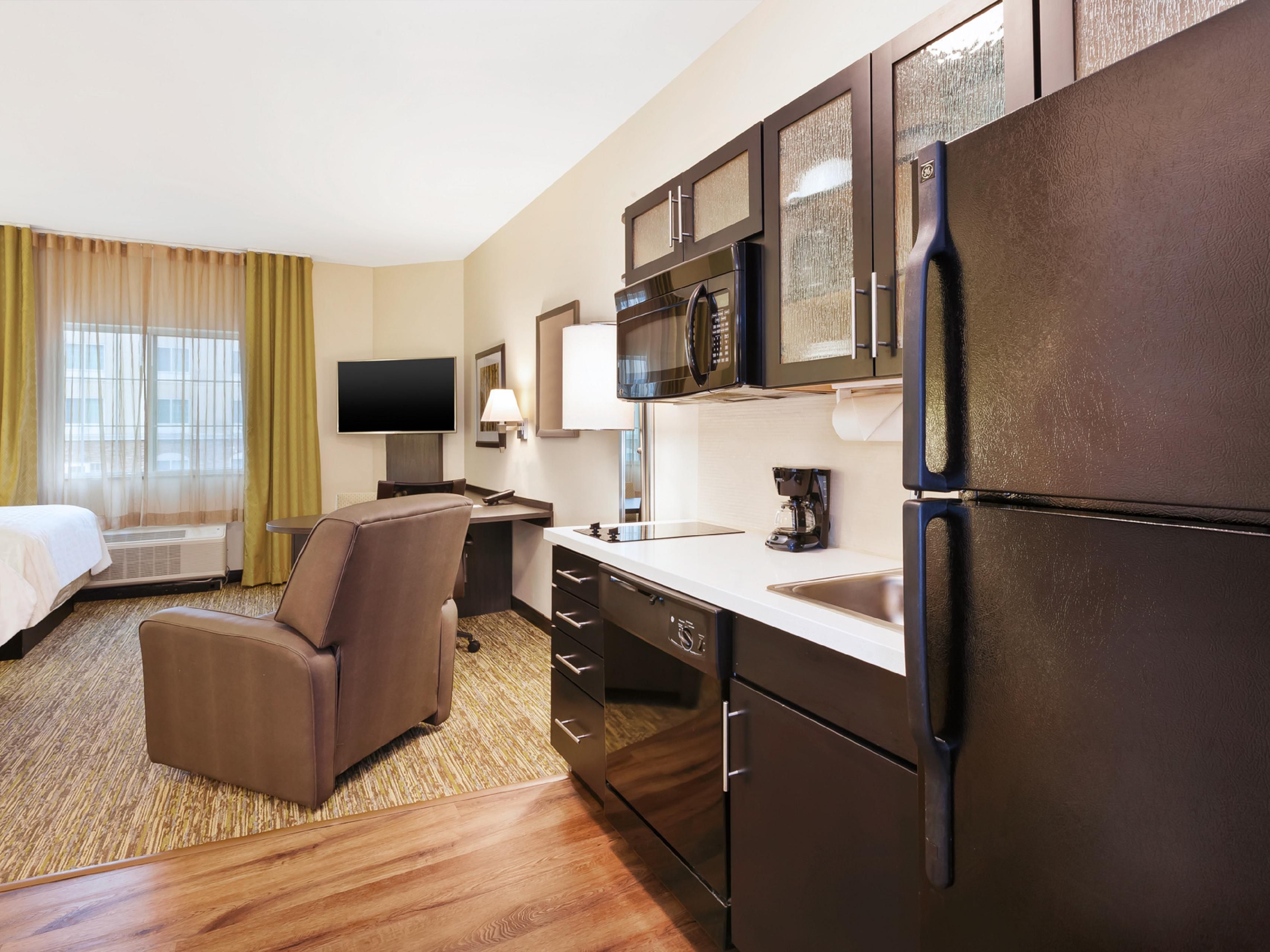 Our all-suite hotel offers fully equipped kitchens in every room and a recliner in front of the TV for your ultimate relaxation.