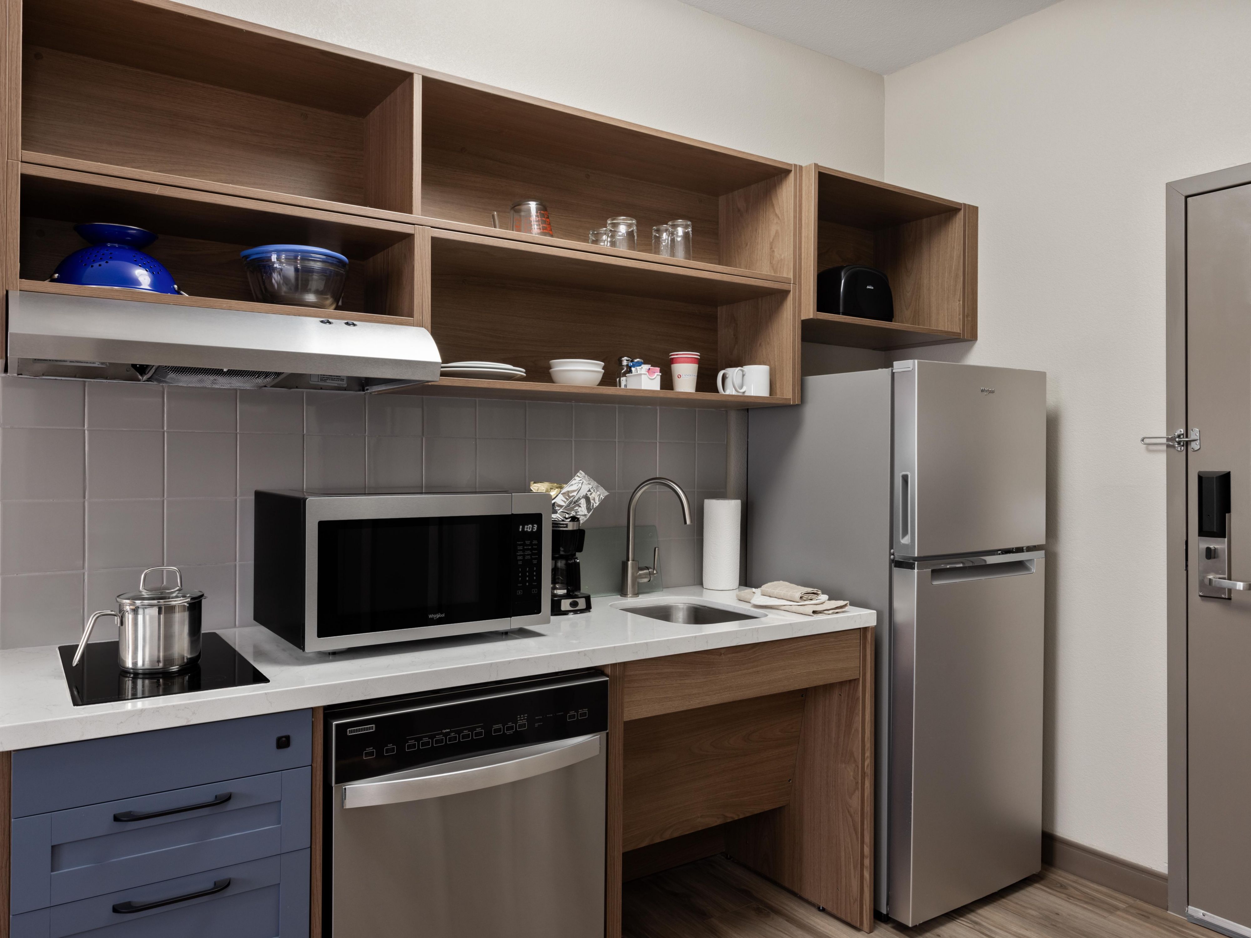 Perfect for extended stays, each suite includes a full kitchen with essentials like a refrigerator, stovetop, and microwave. The self-serve complimentary laundry area adds convenience, too, as you can handle your laundry needs any time of the day or night. Cook and keep up with laundry just like you do at home!