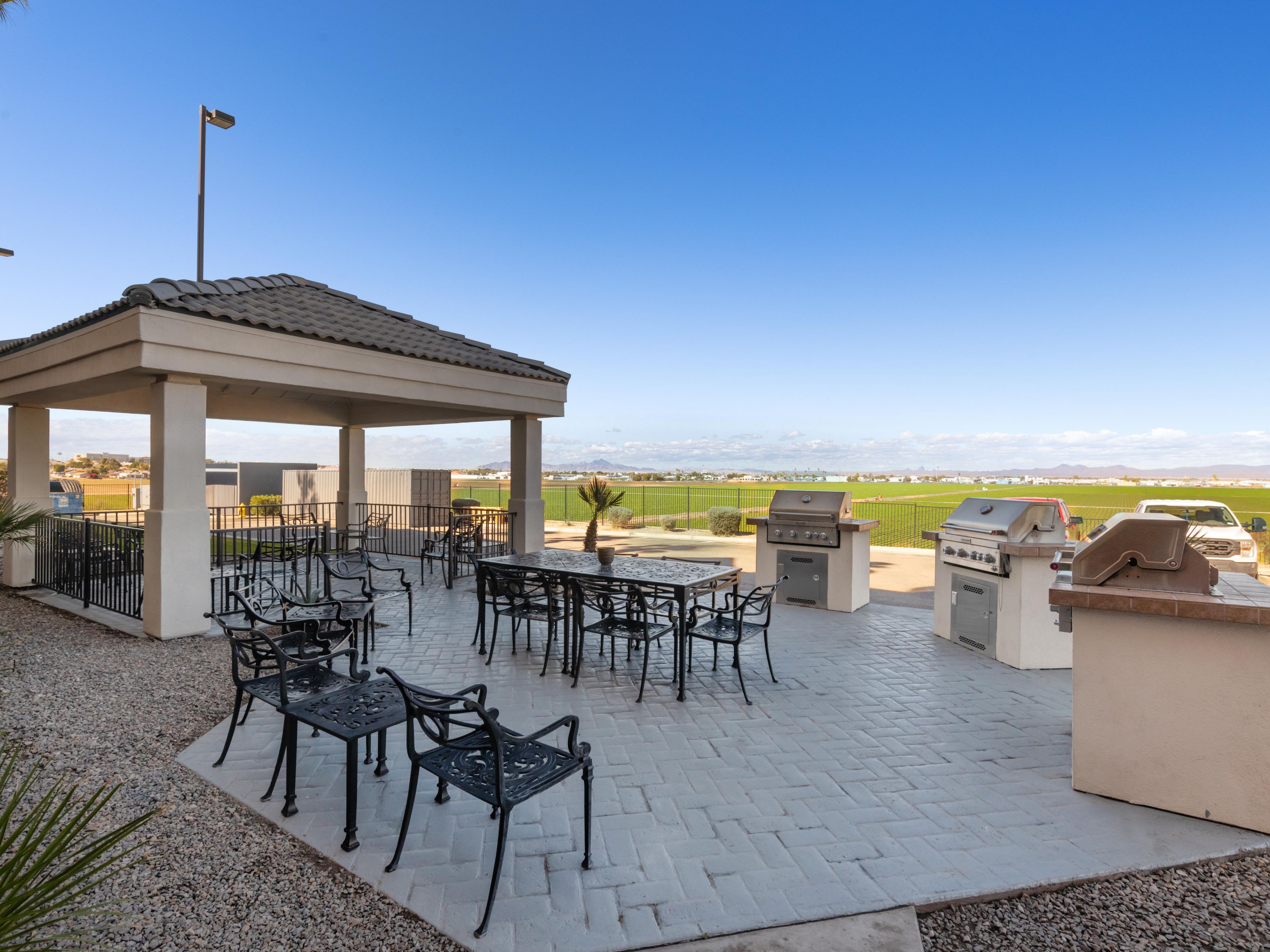 Need a break from eating meals indoors? Grab some sunshine on our spacious outdoor patio and gazebo area equipped with BBQ grills for guests who enjoy outdoor cooking. Invite old friends and new, kick back, and relax with views of beautiful Yuma all around you.