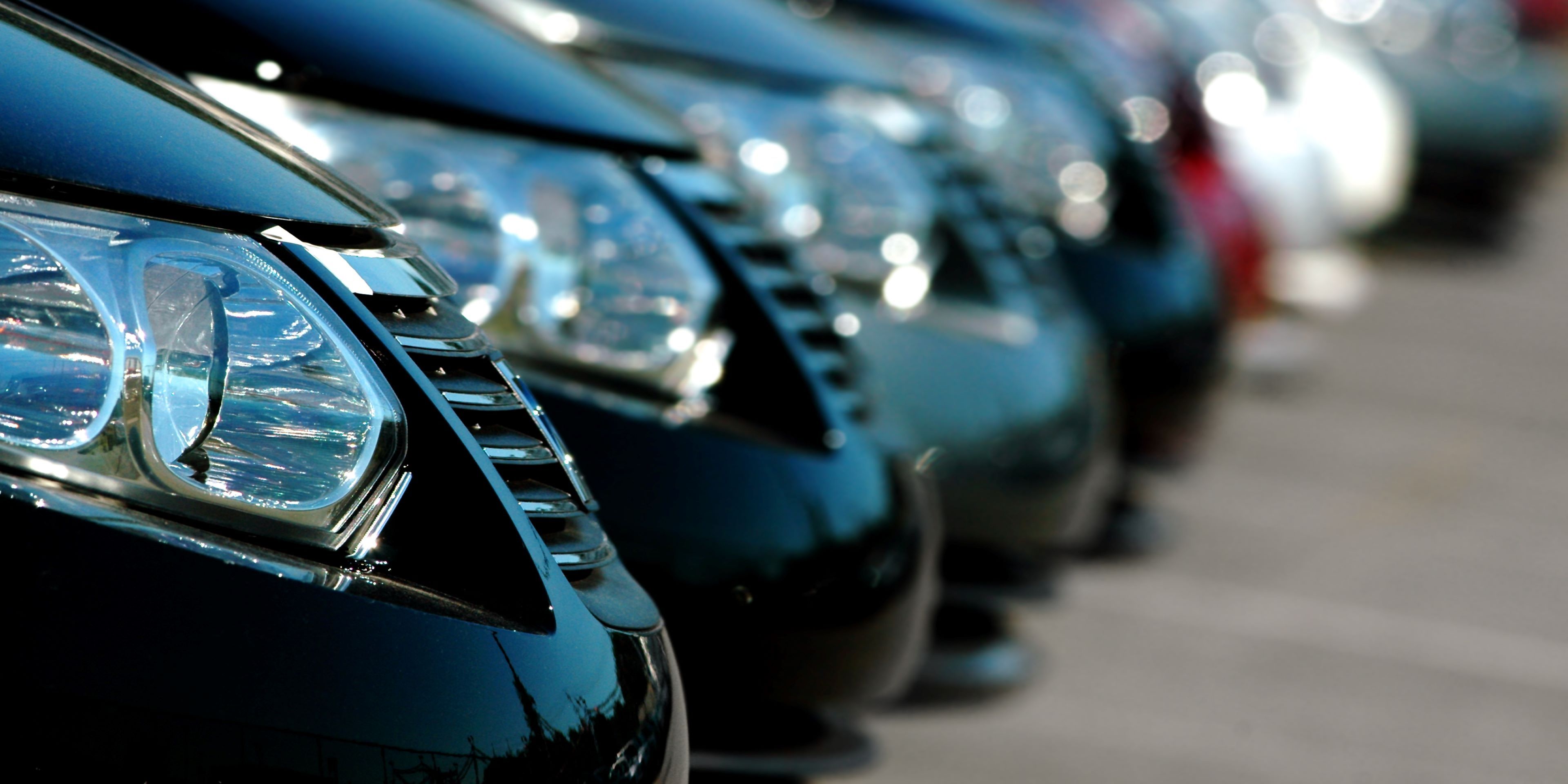 Cars parked in a row.