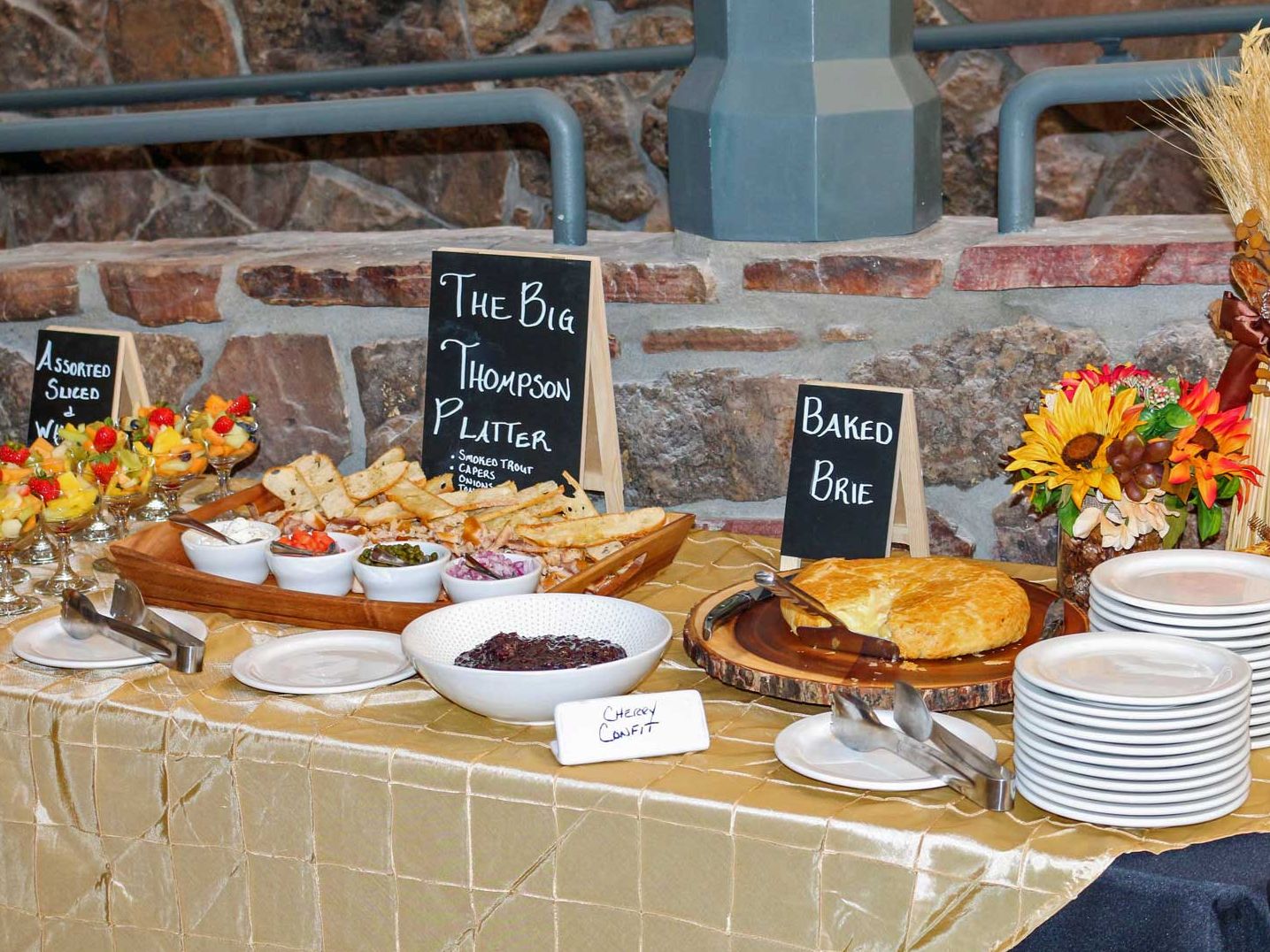 Catered buffet with baked brie