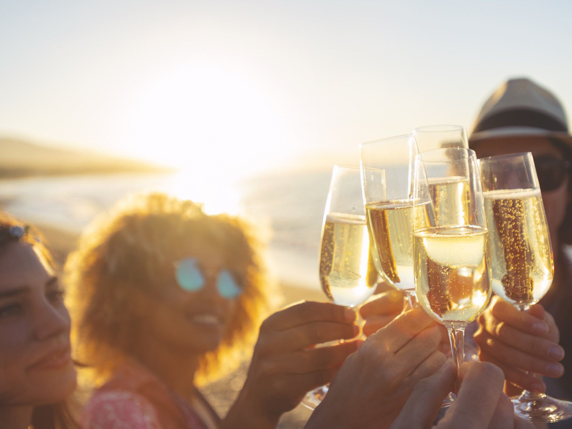 Champagne toast on beach
