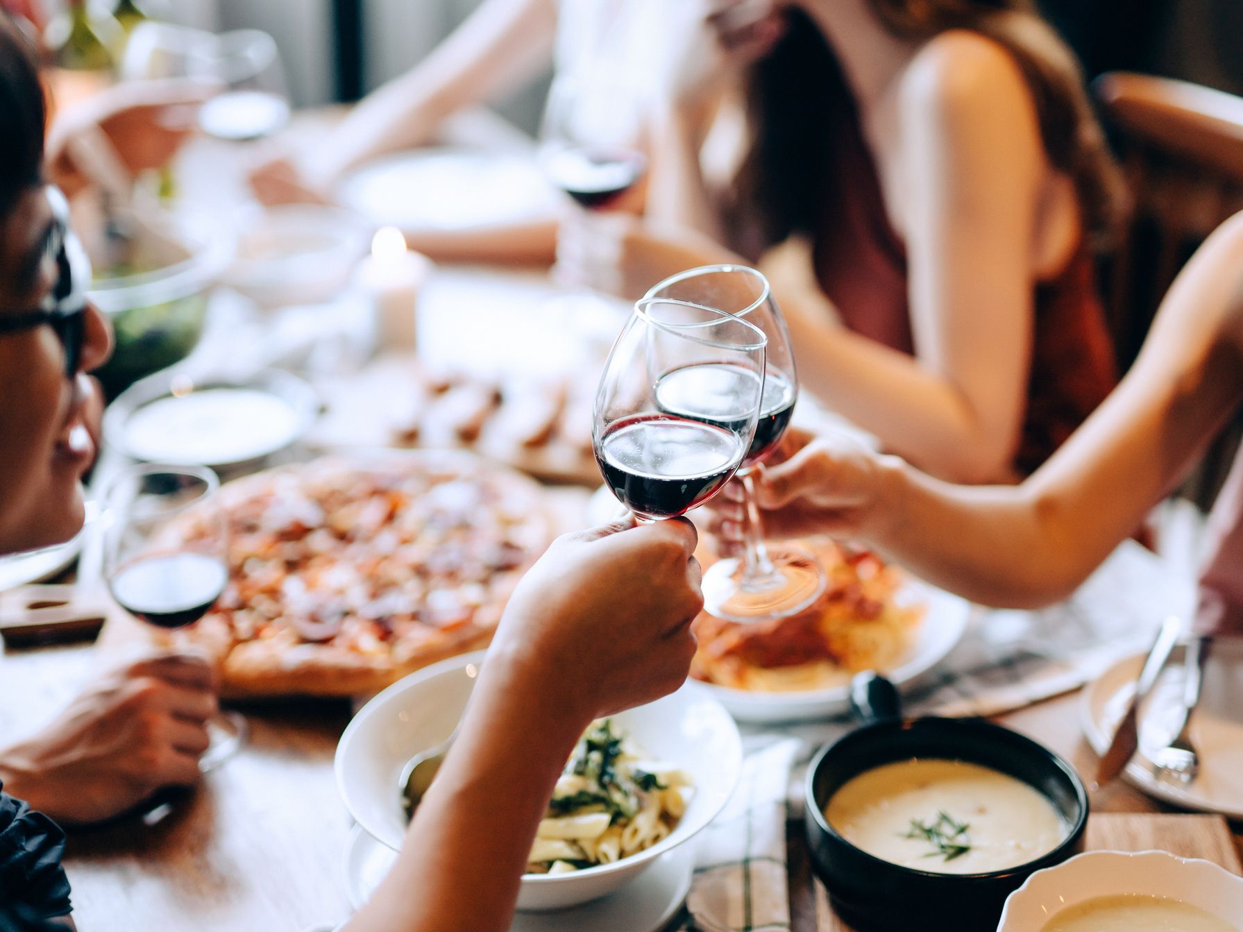 Cheersing at a dinner party