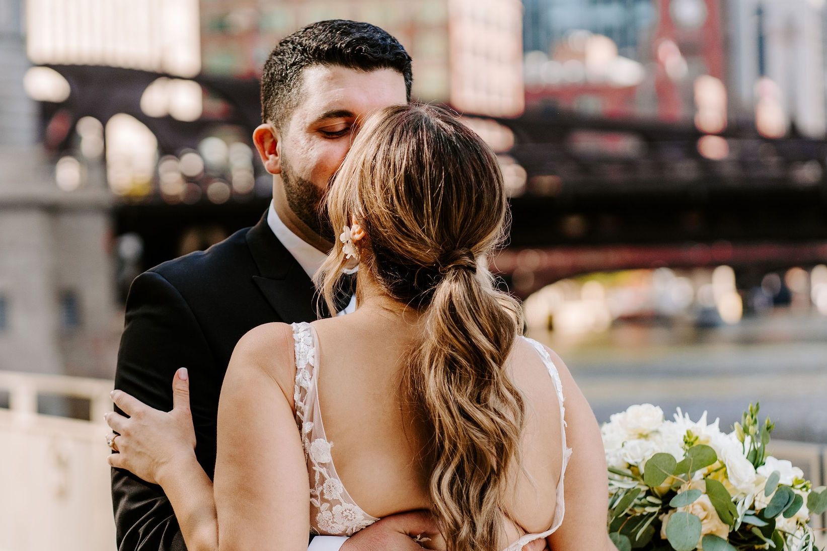 Couple kissing after wedding