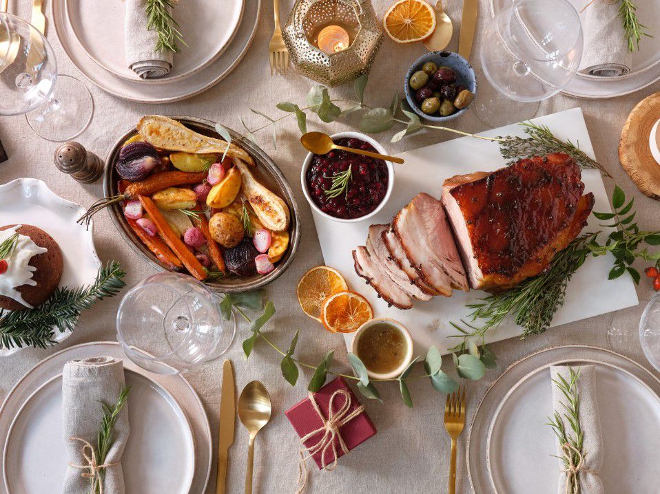 Lunch spread with turkey, vegetables, and desserts