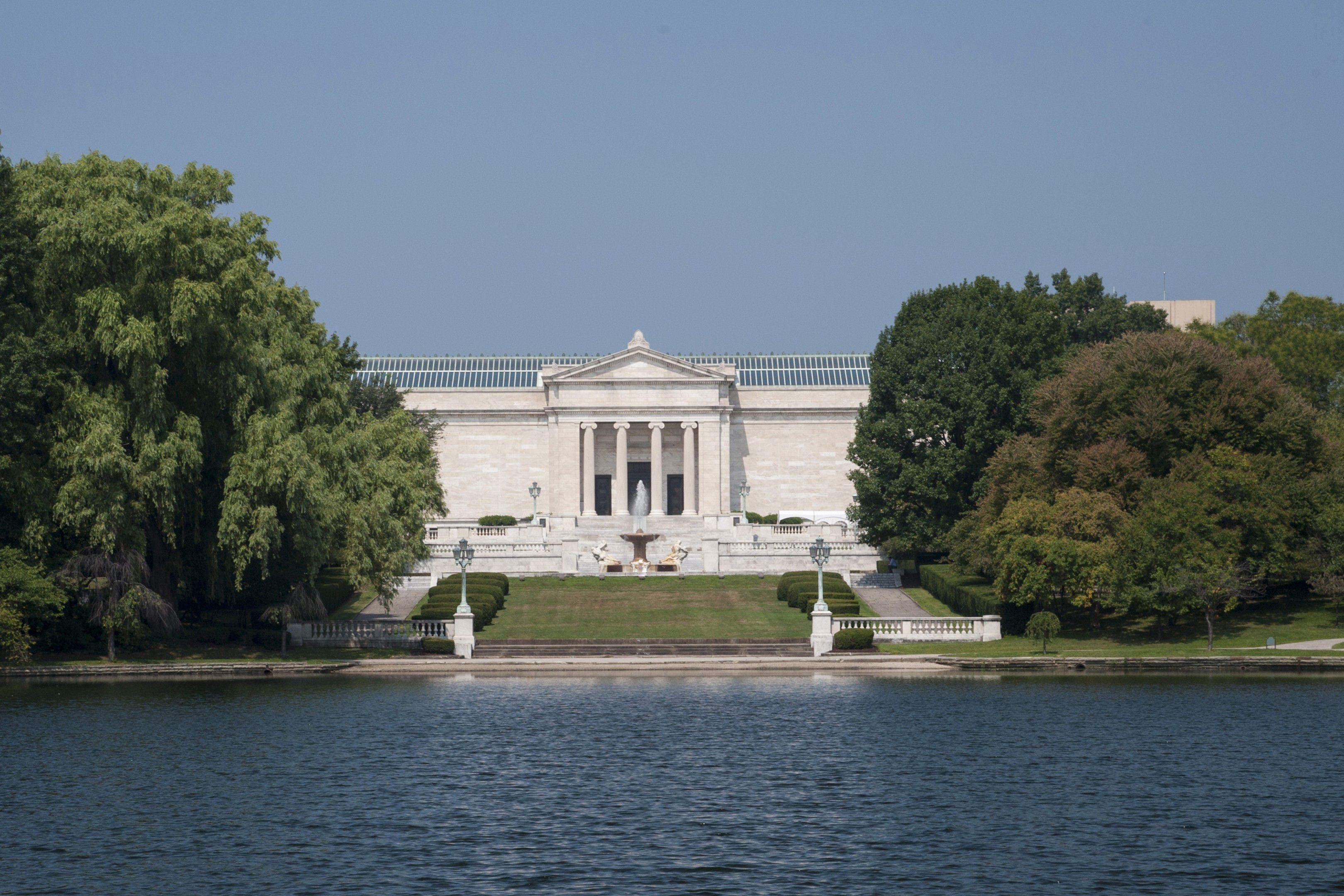 Cleveland Museum of Art reflected in a scenic pond.