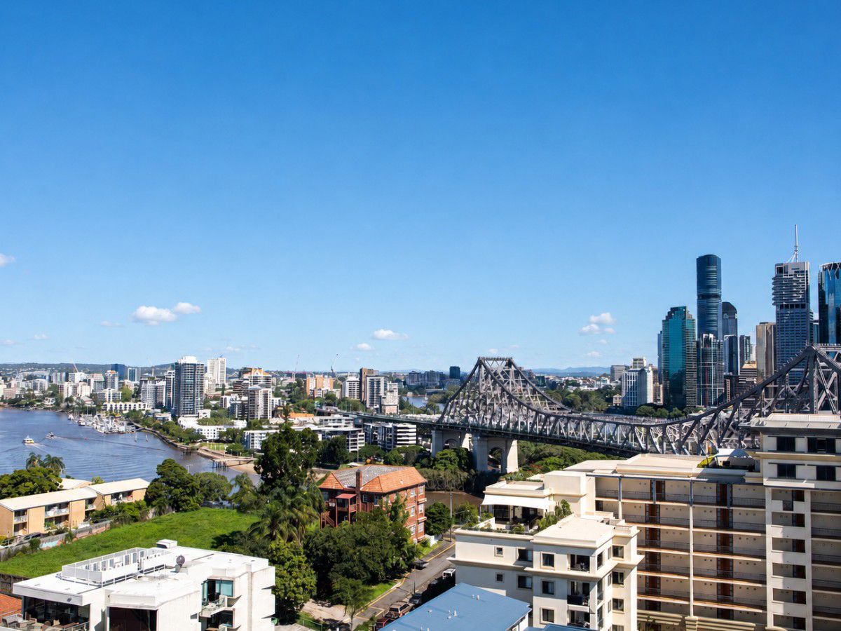 Brisbane skyline with river, bridge, and skyscrapers