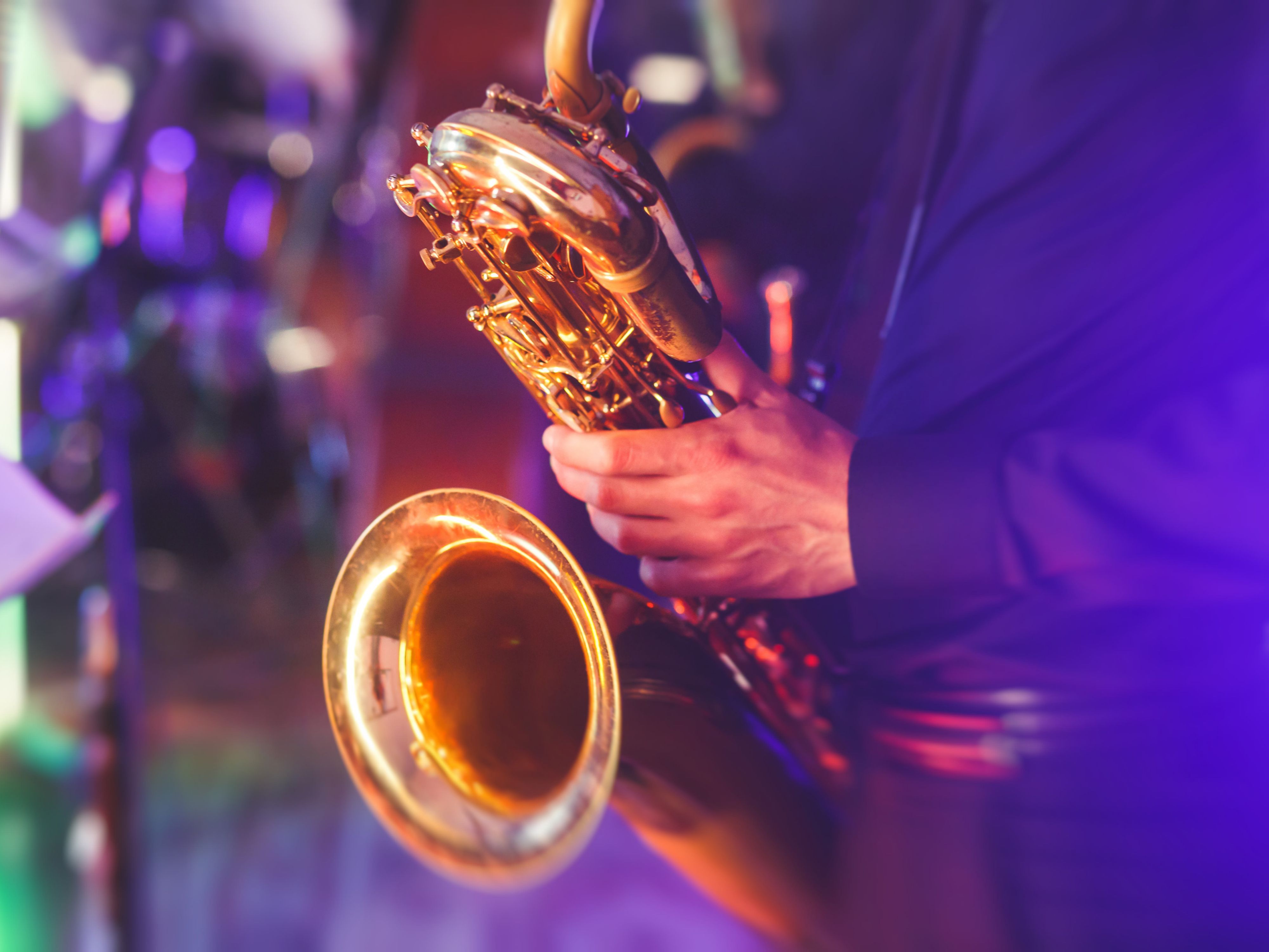 Playing saxaphone at a concert
