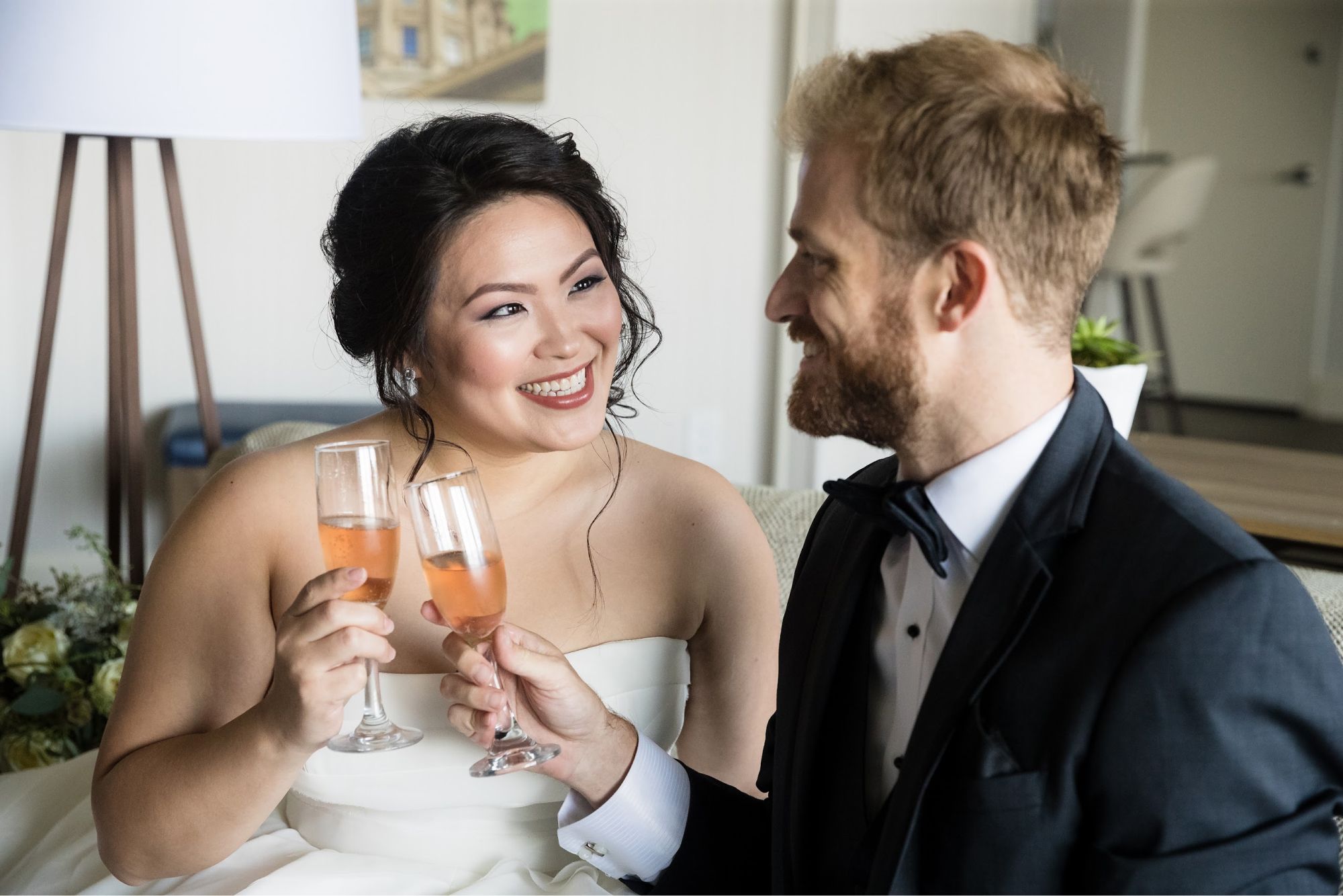 Bride and groom toasting