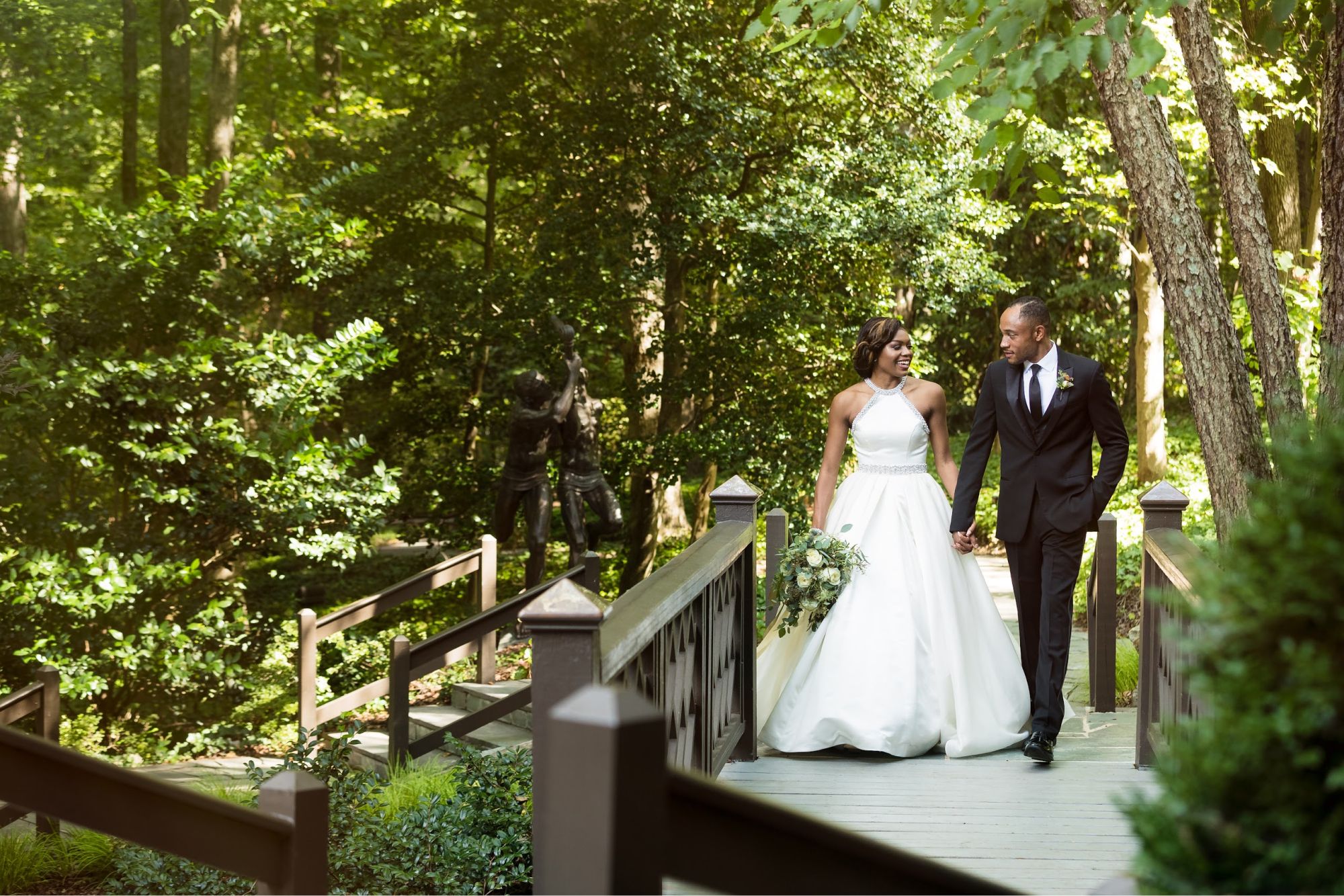Bride and groom walking in nature