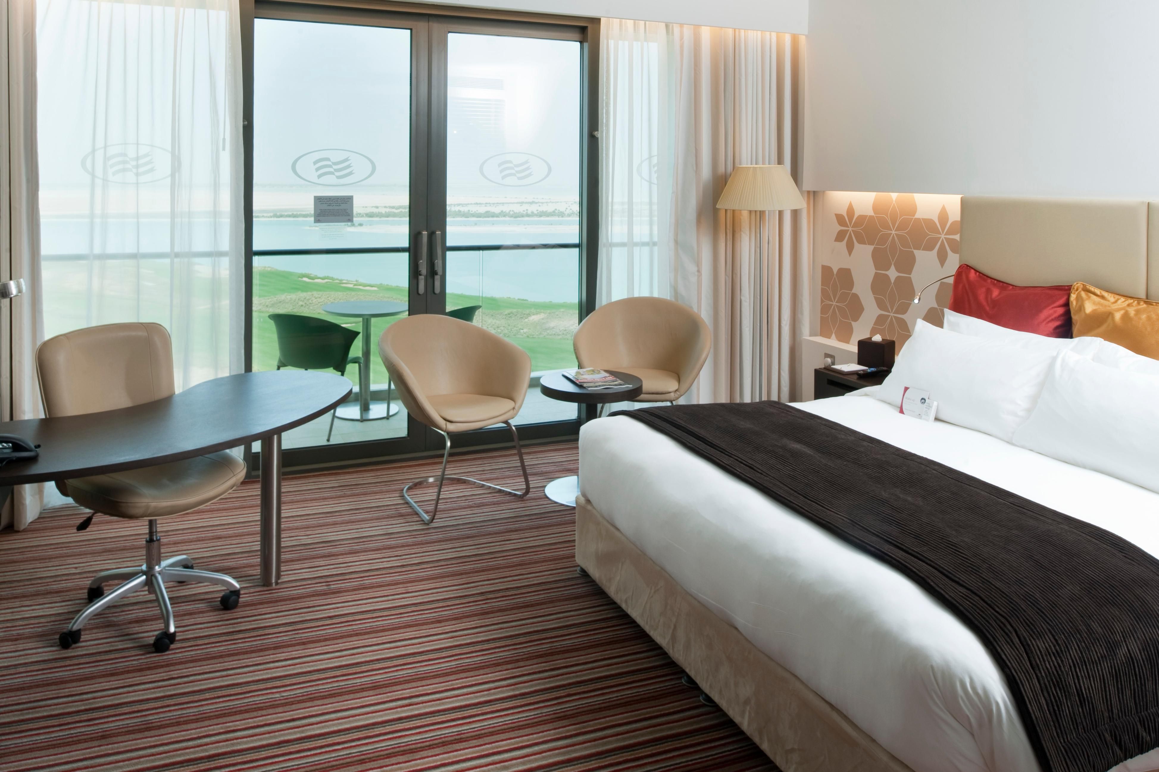 Enjoy a breathtaking view of the sea in our Deluxe Room