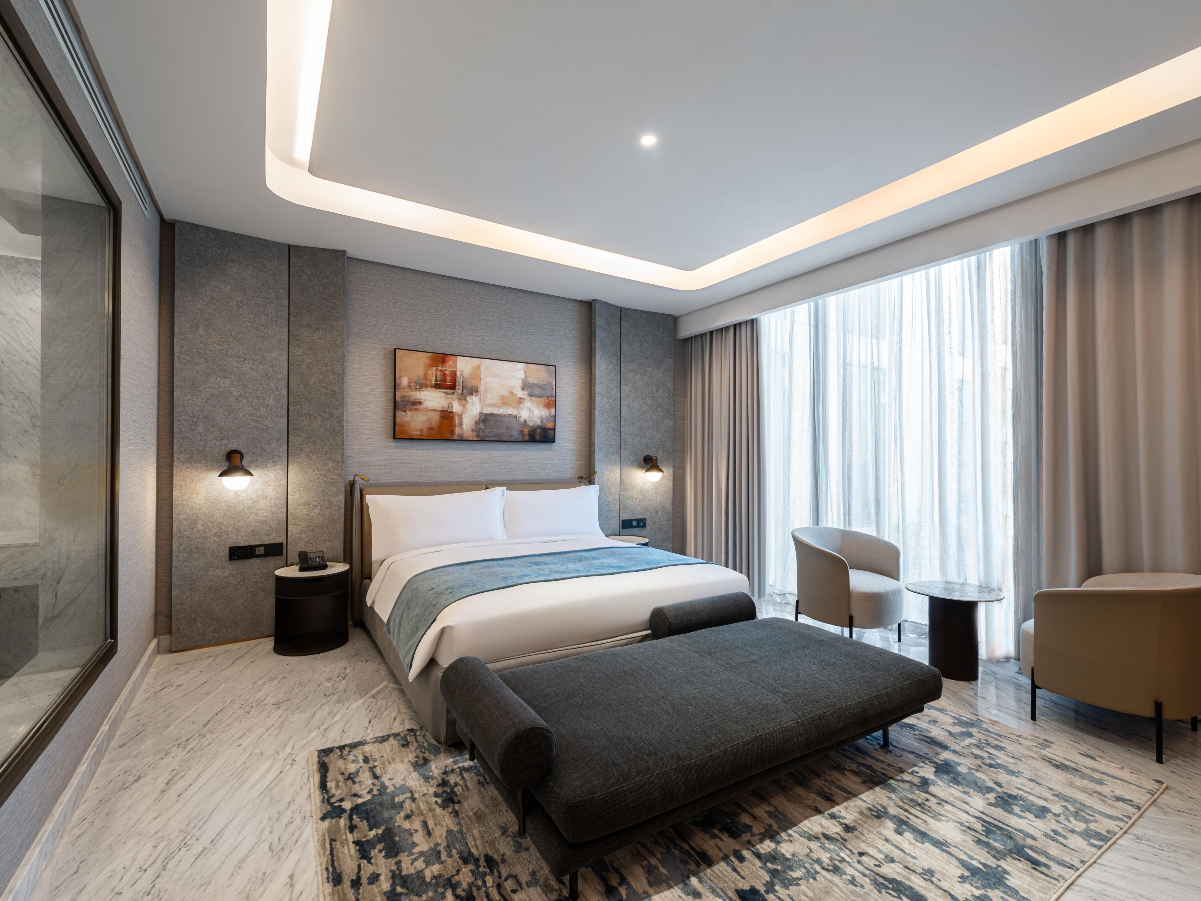 The Royal Suite at Crowne Plaza Al Jubail offers refined elegance and spacious comfort. Featuring a main double bedroom, twin room, elegant dining area, fully equipped kitchen, and expansive sitting room, it’s designed for both relaxation and productivity, ensuring an exceptional stay for discerning travellers.