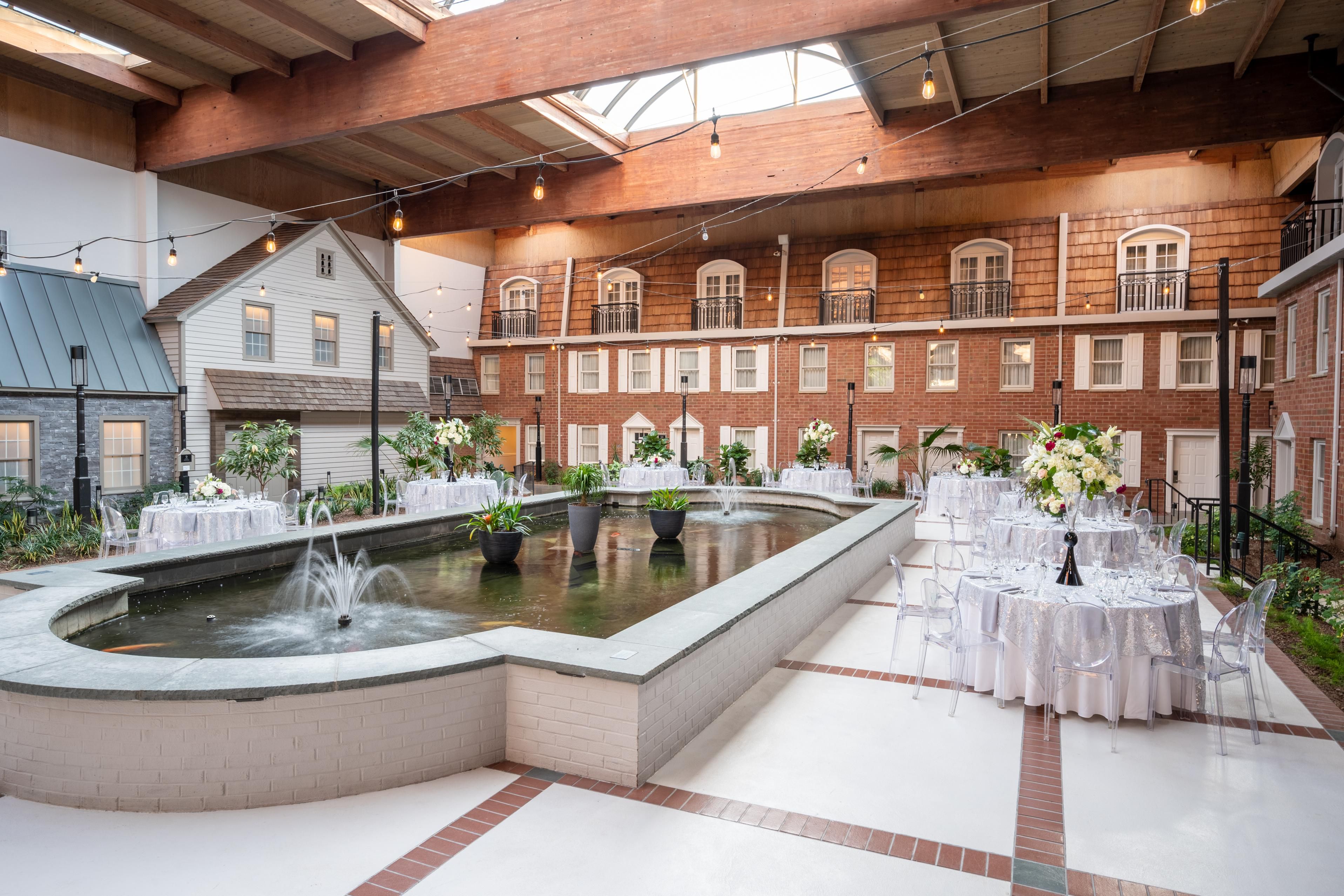 Host 200 guests around our beautiful indoor landscaped koi pond