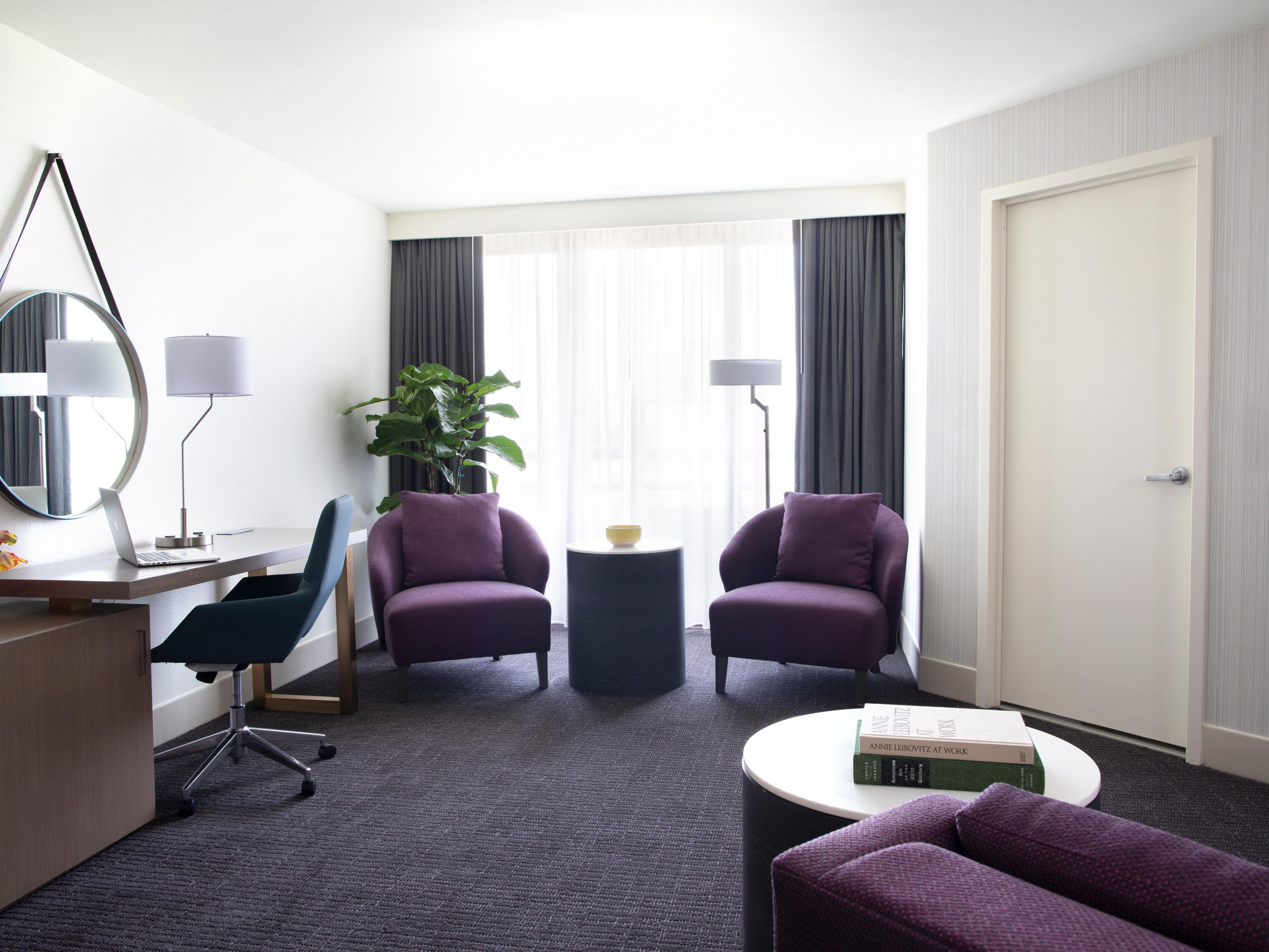 junior suite with seating area and desk