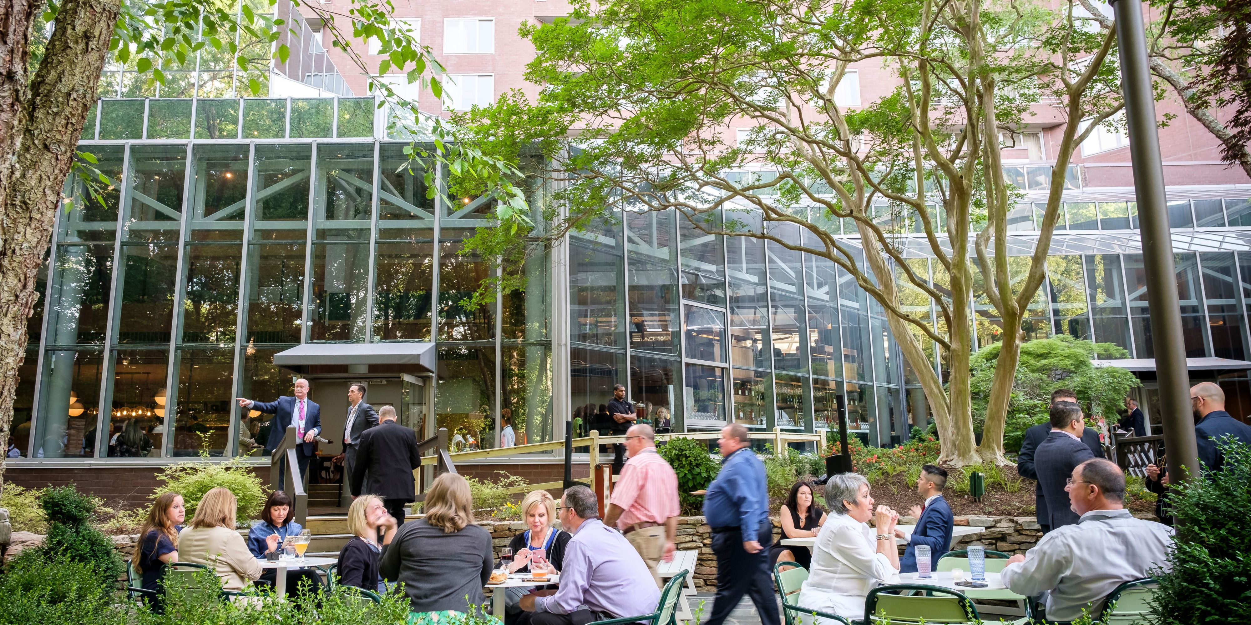 Escape to The Backyard at Parkwoods, our open-air retreat featuring serene walking trails, tranquil waterfalls, and cozy firepits. Seasonal outdoor dining and relaxed seating make it the perfect spot to recharge, host a casual meeting, or unwind.