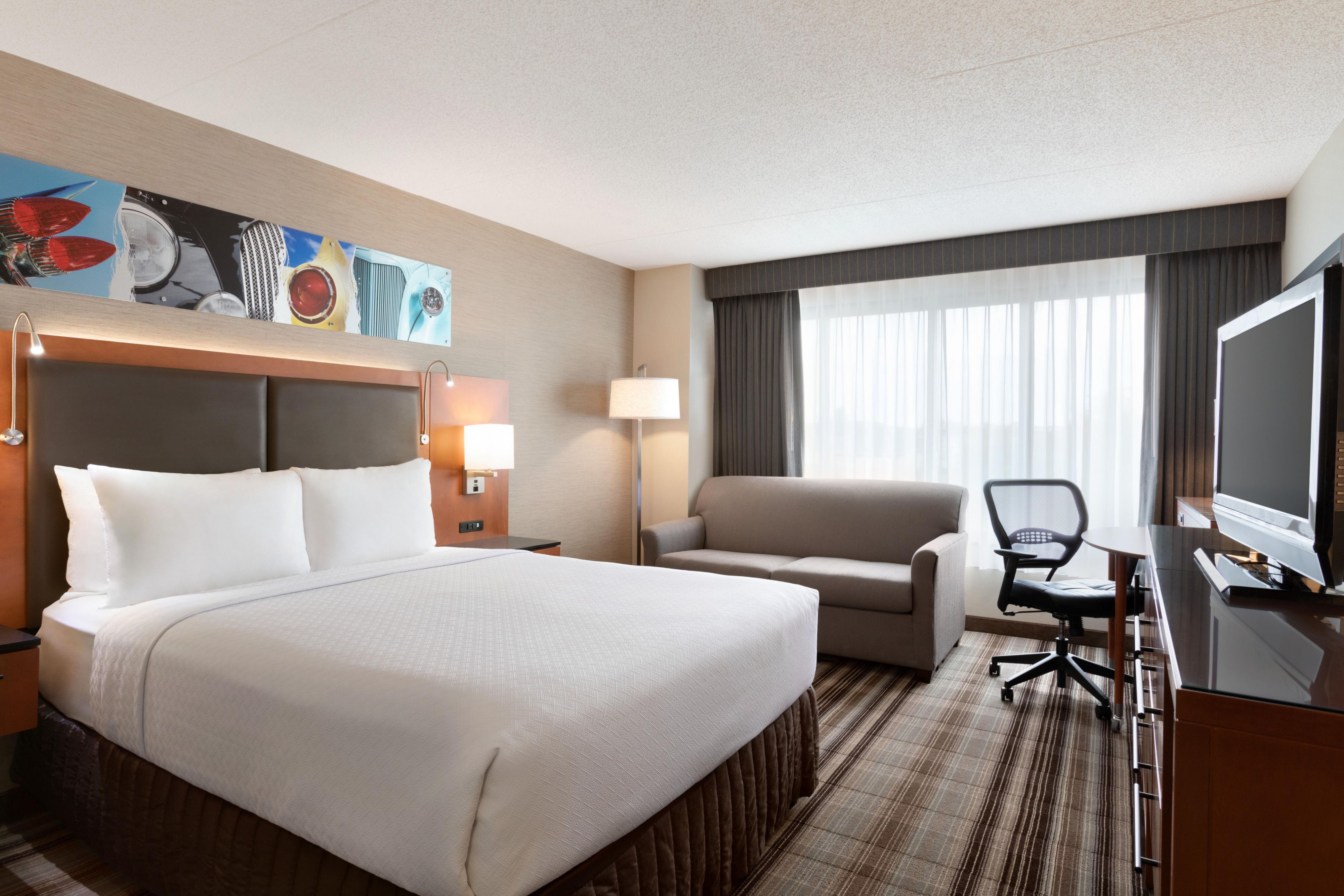 Enjoy comfort, space and style in our standard queen guest room.