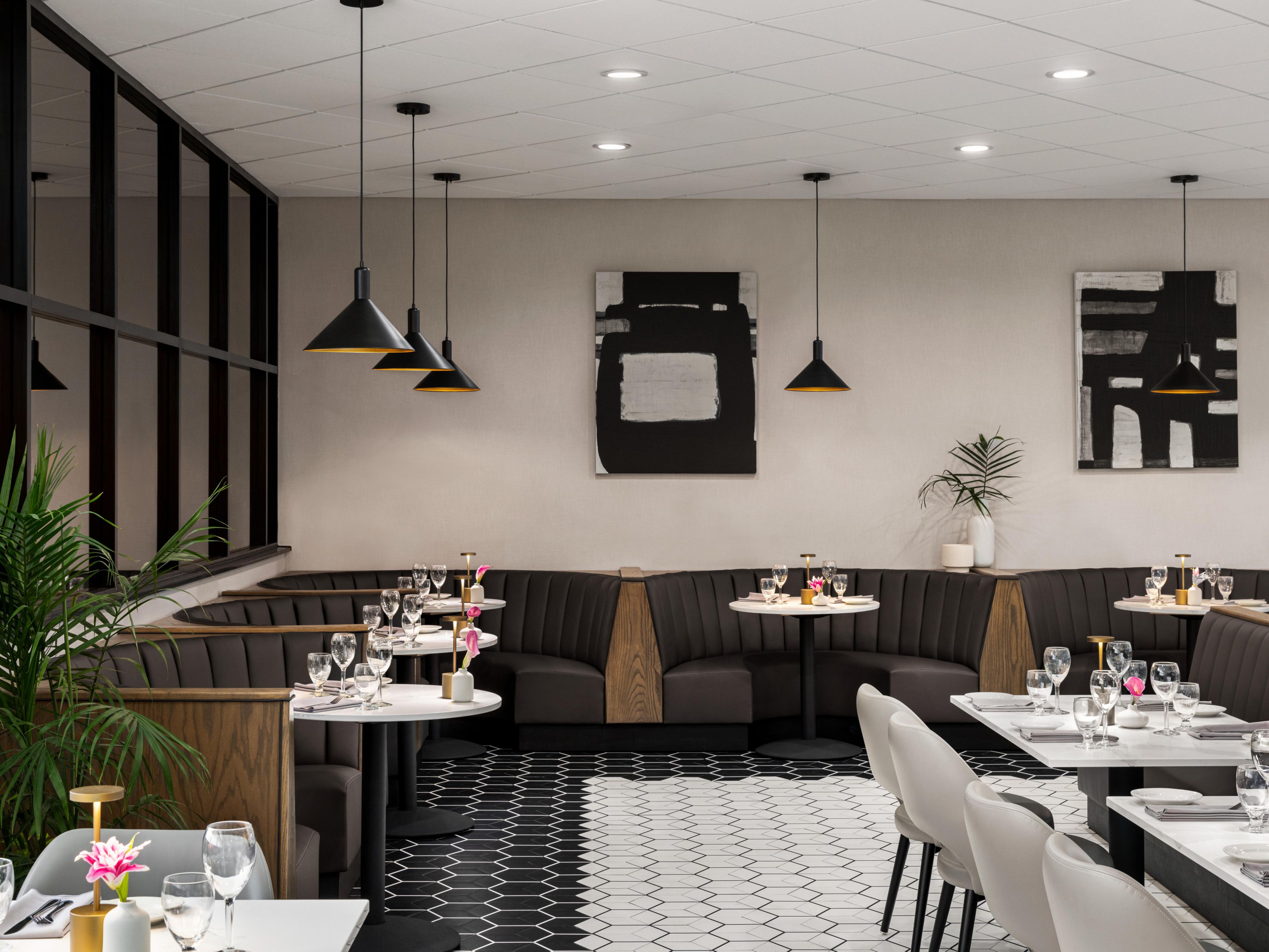 Booths and table seating at on-site restaurant.