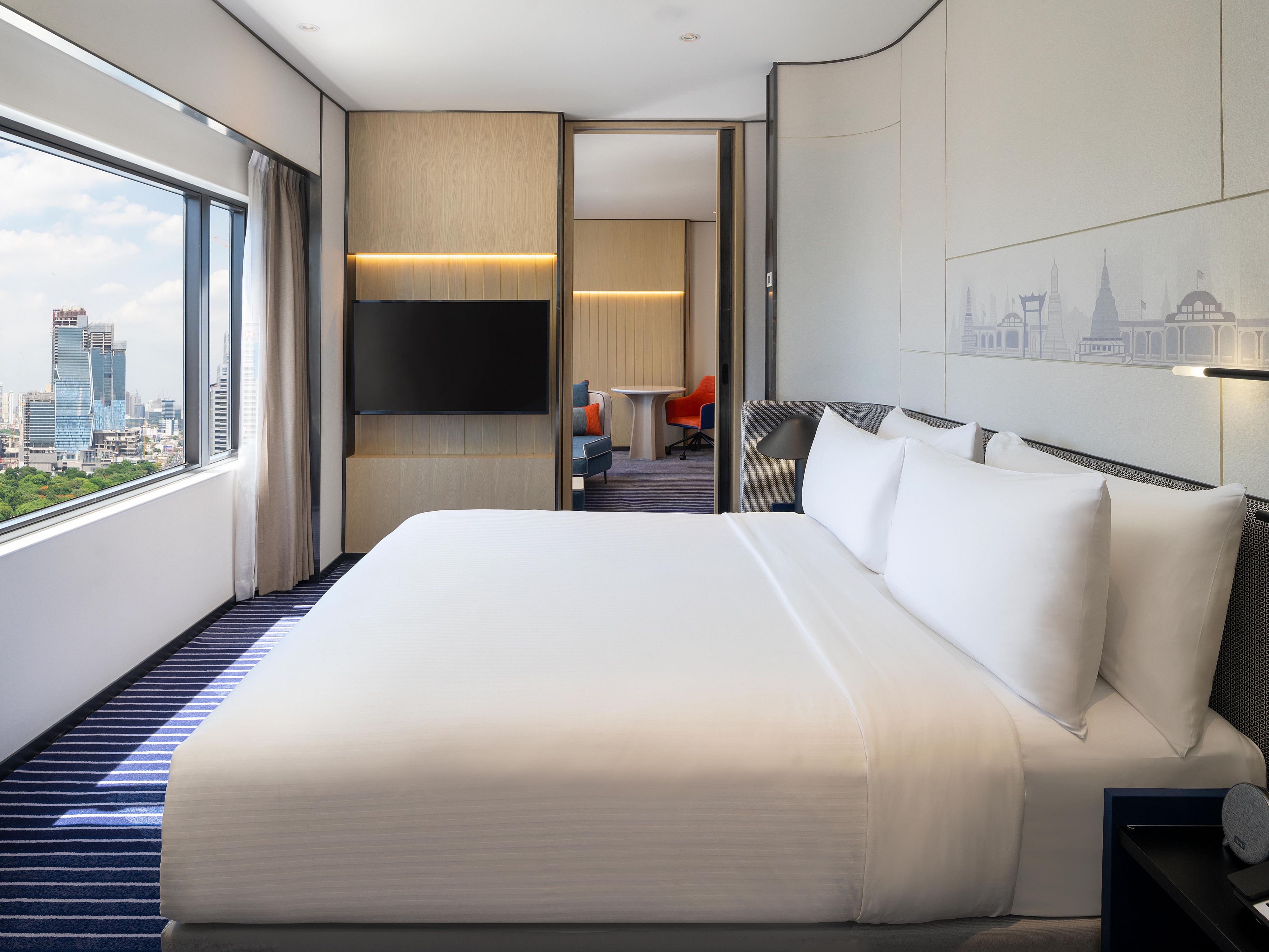 Discover your home away from home in our spacious suites. Each suite features stylish décor, separate living and bedrooms, and stunning Bangkok views. Enjoy a comfortable and convenient stay with well-equipped in-room facilities designed for your relaxation and comfort.