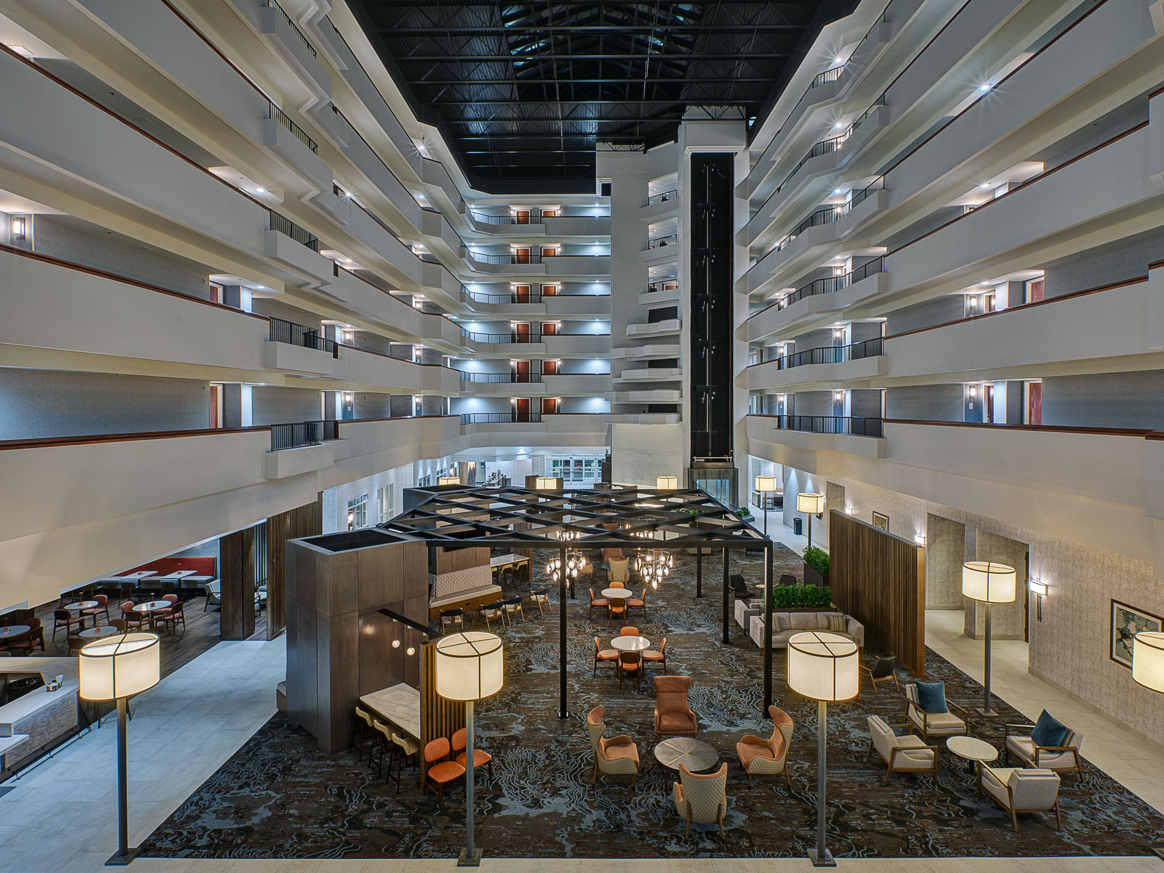 Elegant Hotel Lobby Atrium Featuring Open-Concept Gathering Spaces