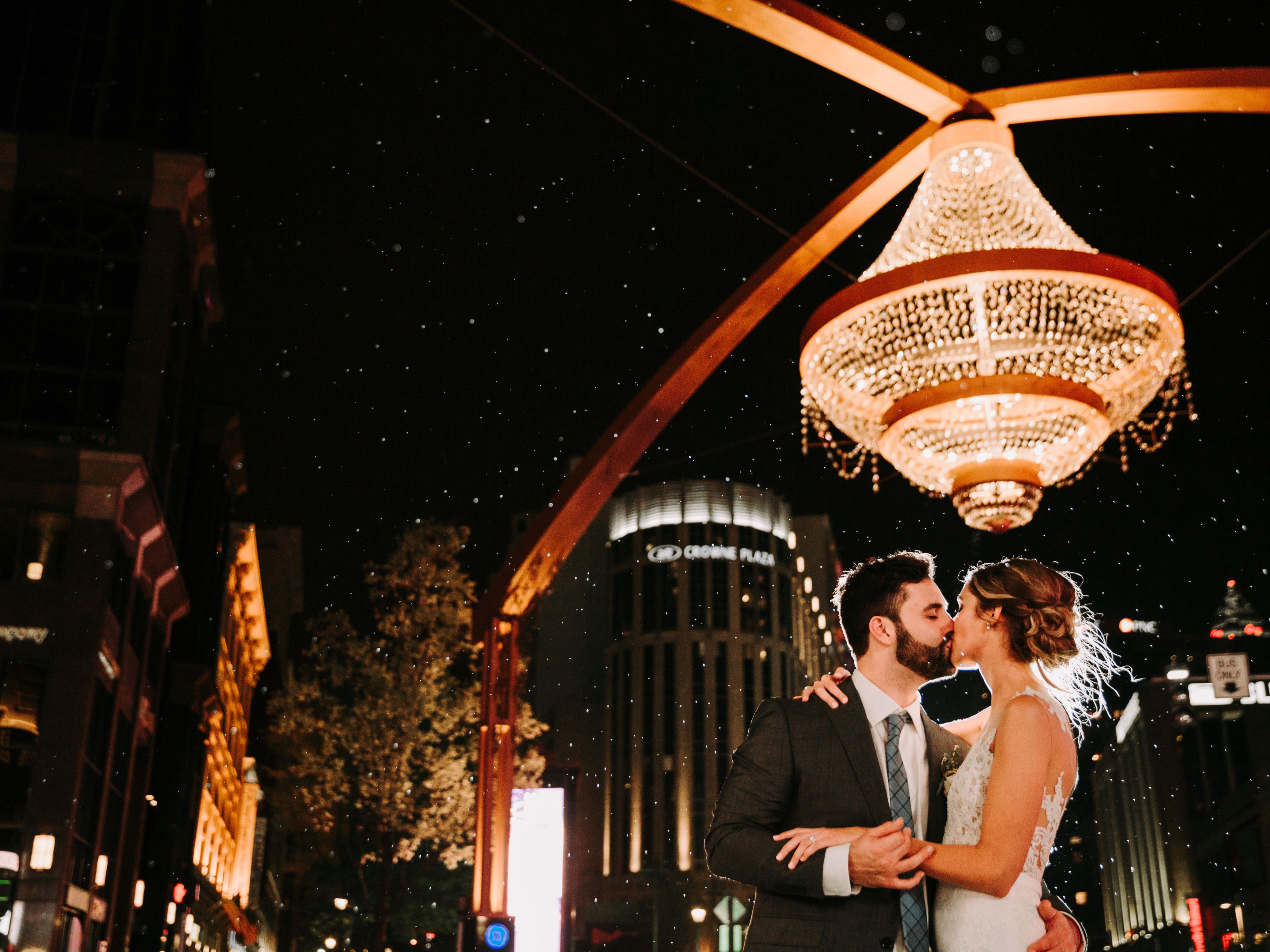 Couple getting married outside of Cronwe Plaza Cleveland at Playhouse Square