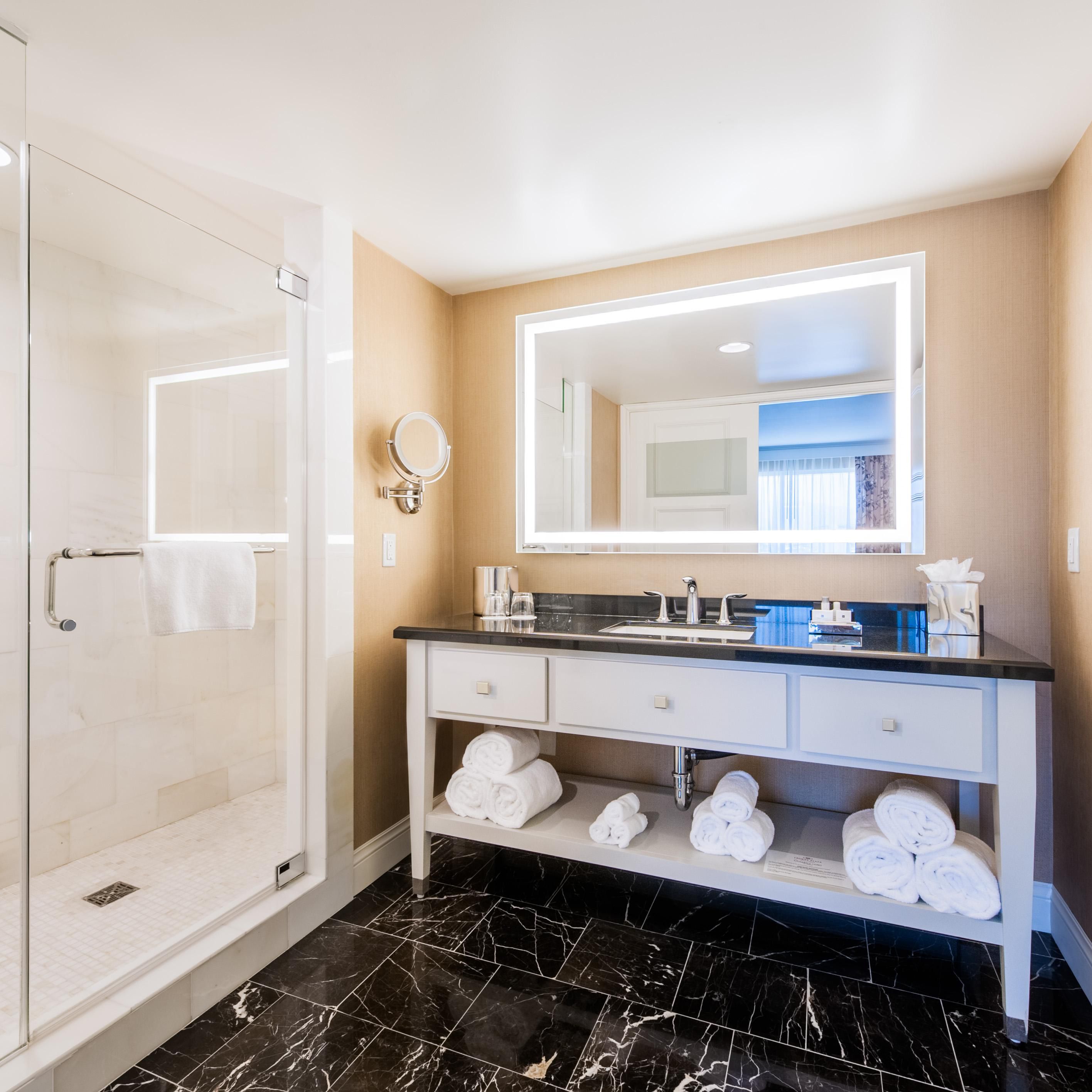 Get ready in style in the 2 room king suite bathroom