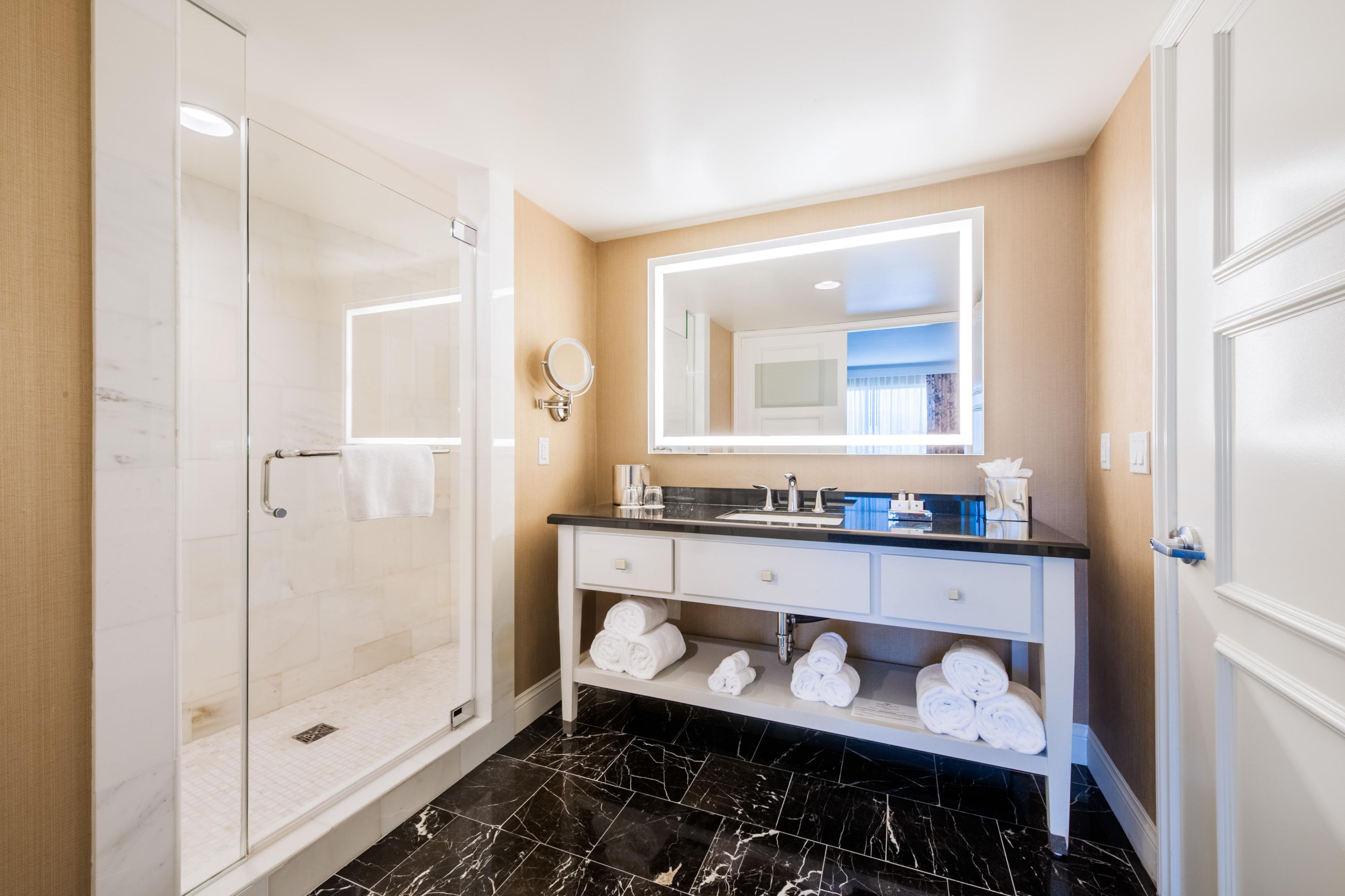 Get ready in style in the 2 room king suite bathroom