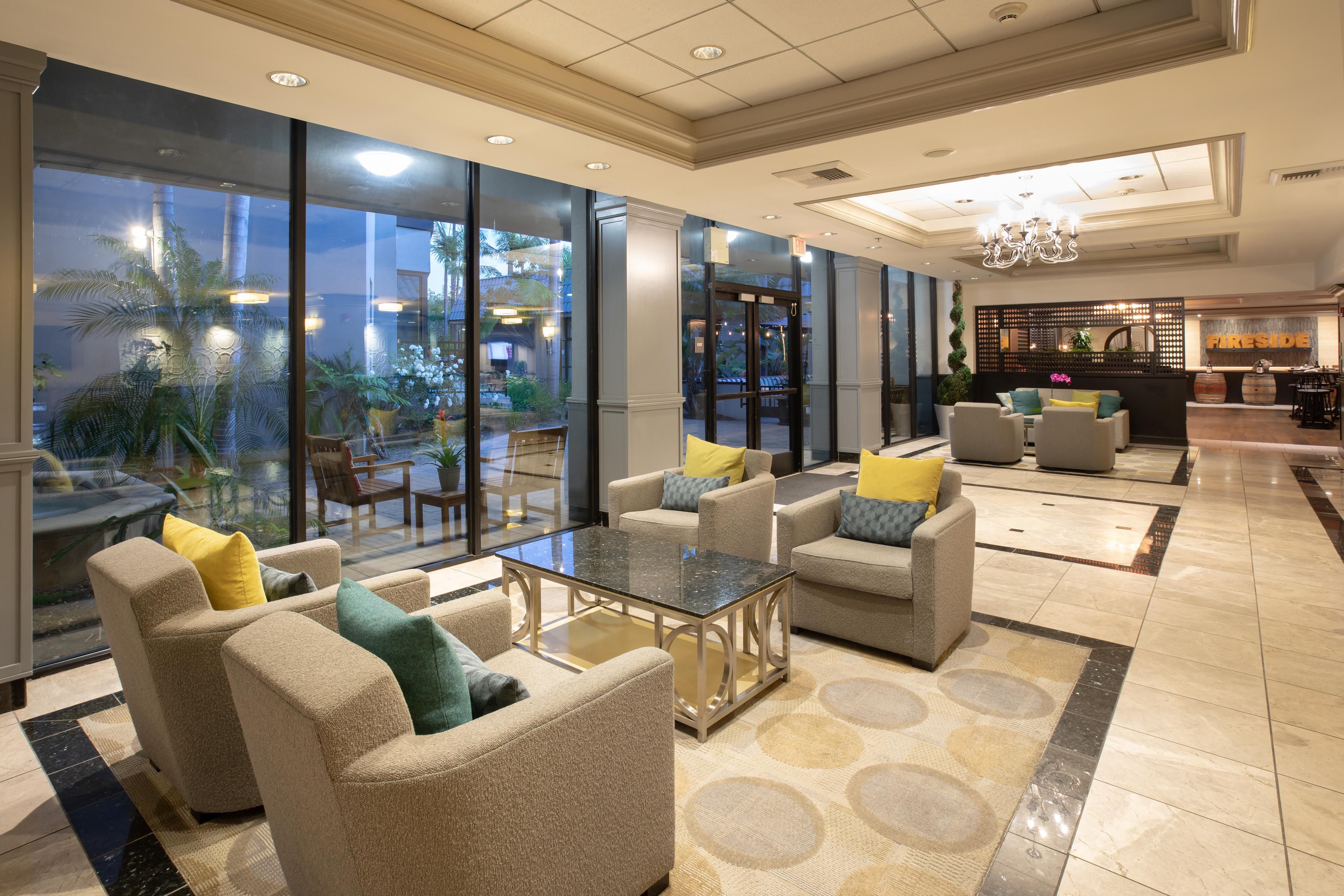 Relaxing Lobby with easy access to Fireside Tavern and Patio