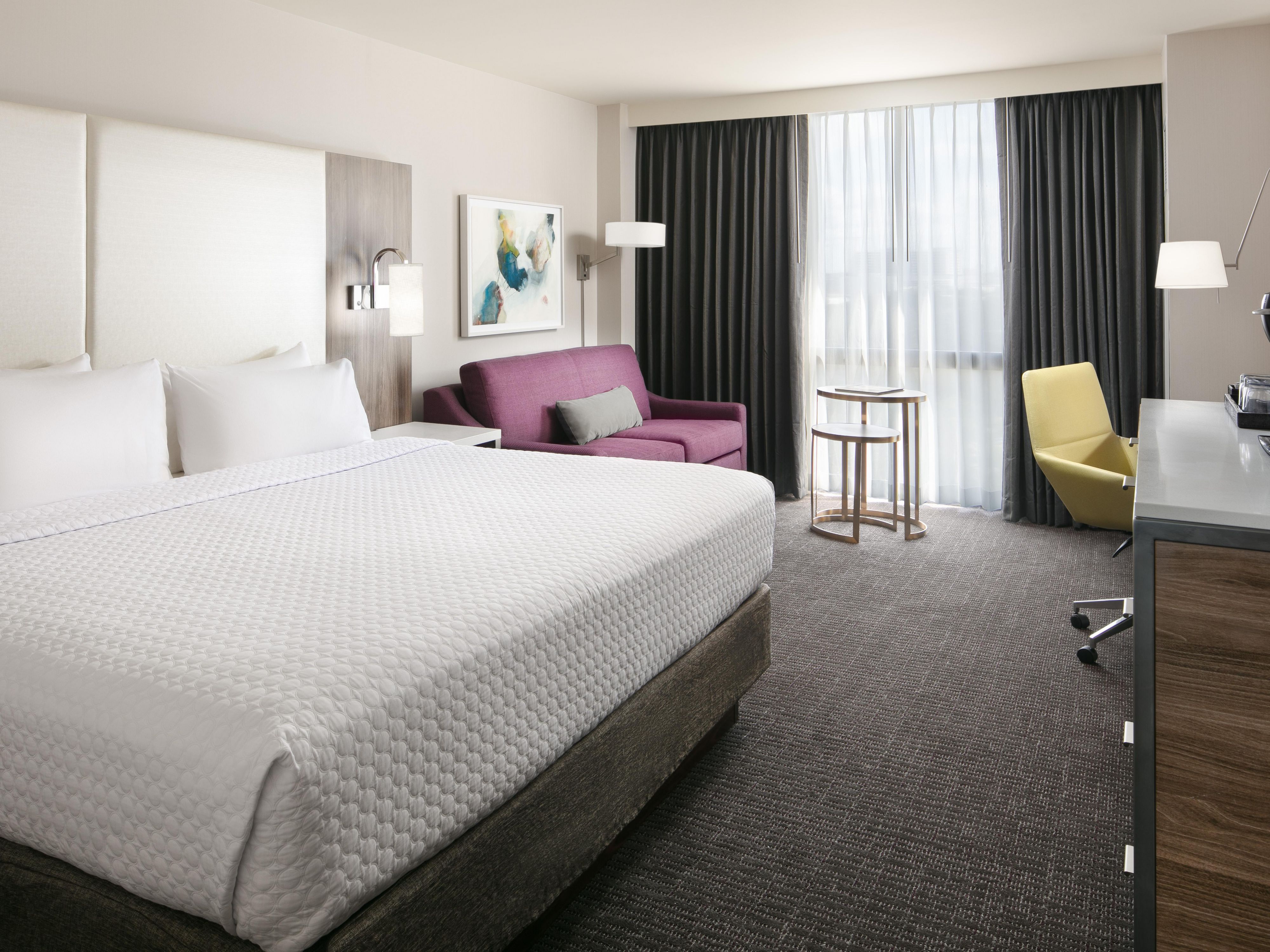 Wake up feeling energized when staying at our family-friendly hotel near Dallas Market Center. Each thoughtfully-designed guest room features plush beds outfitted with premium bedding, a spa-inspired bathroom, and complimentary Wi-Fi. Plus, our rooms have a workspace great for guests who will be working remotely while in town.