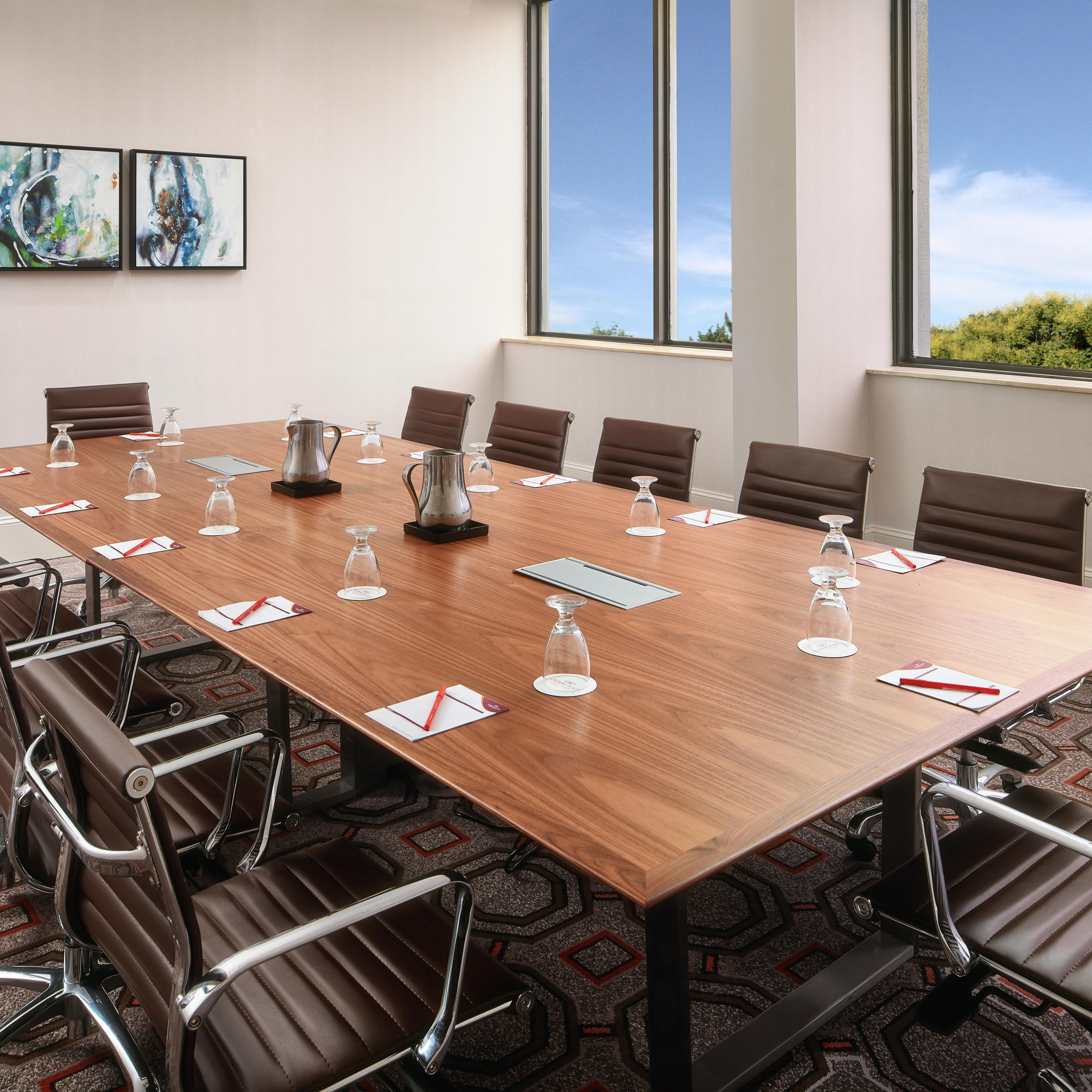 Our executive table and comfortable chairs are ideal for meetings.