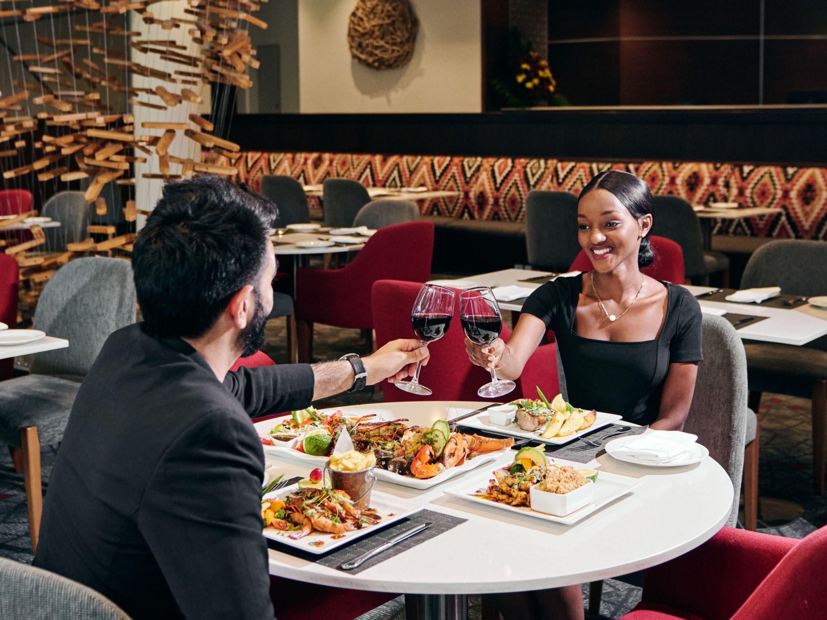 Starters: Crowne Caesar Salad with grilled chicken, Grilled Tuna & Mango Salad, Thai Spring Rolls with mango salad. Mains: Char-grilled fish fillet, Flame-grilled quarter chicken, Beef tenderloin with seasonal vegetables & fondant potato. Desserts: Sticky toffee pudding, Chocolate brownie, Fruit salad & vanilla ice cream