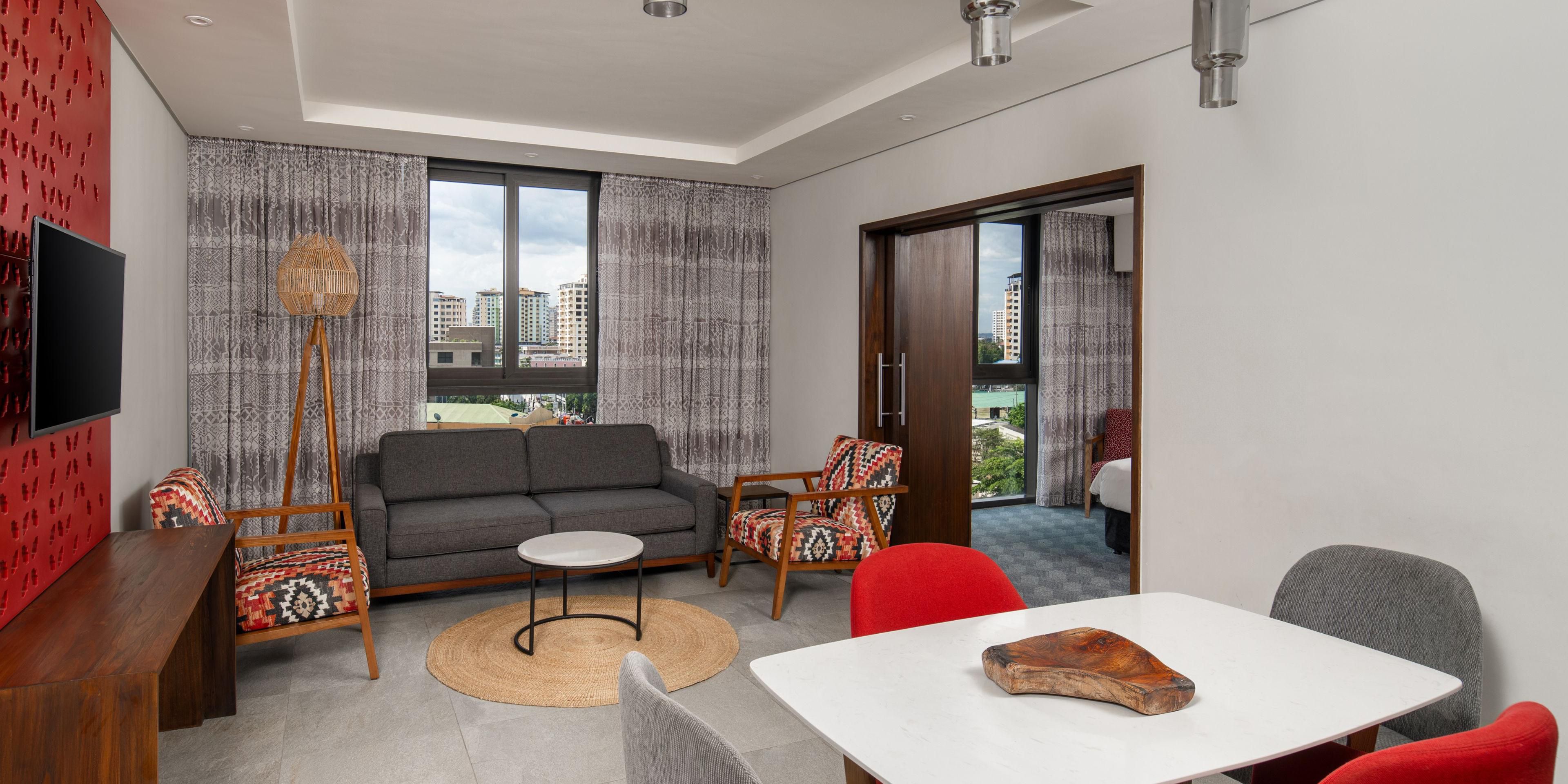 Step into generously sized rooms featuring queen or twin beds. Meticulously designed for rejuvenation and productivity, options include both showers and bathtubs. Our commitment to accessibility is evident, with tailored rooms for guests with specific needs.