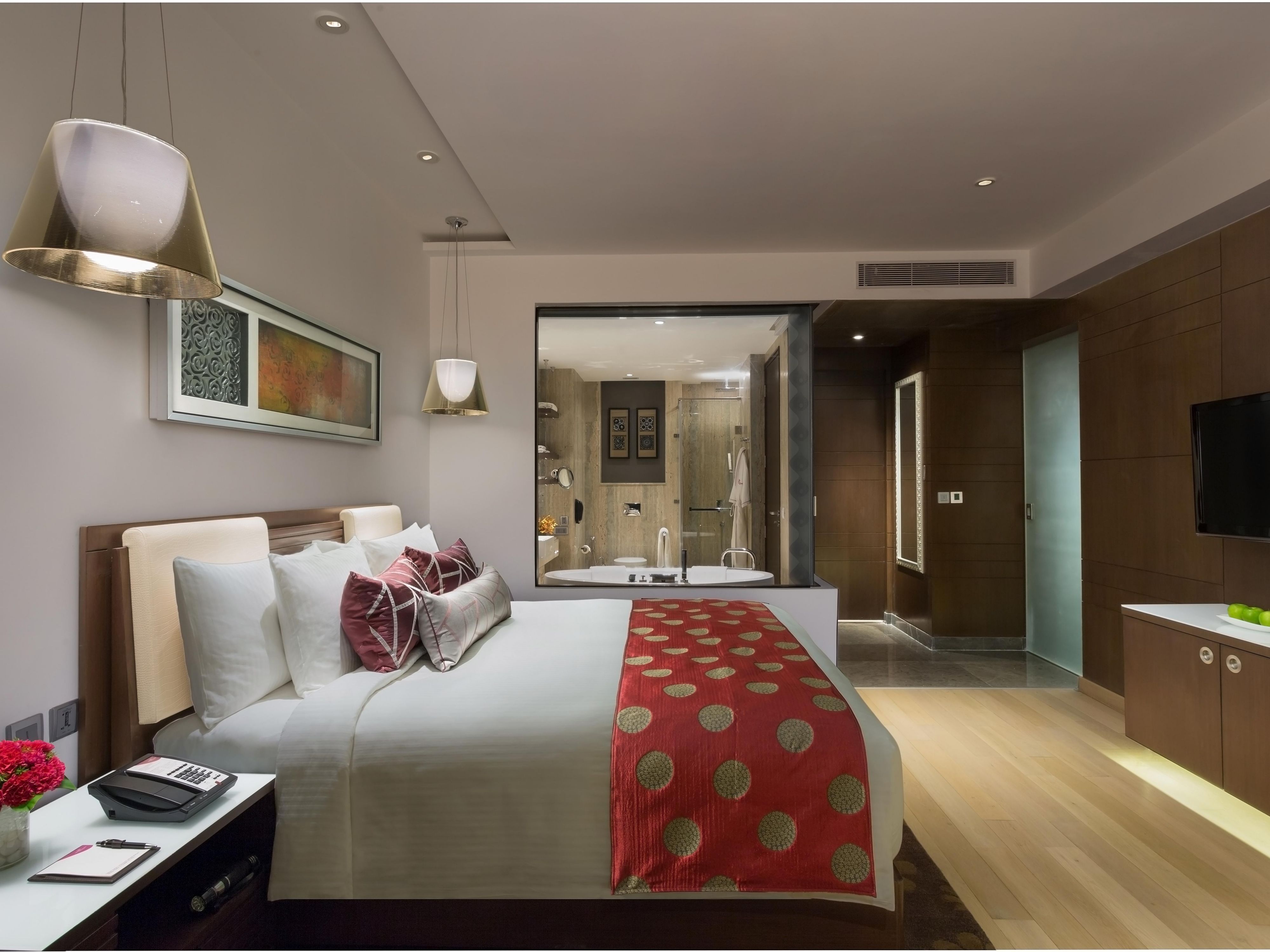 Enjoy a luxurious stay at the spacious and tastefully designed apartments and suites at Crowne Plaza Greater Noida. The expansive rooms offer a perfect balance of business and pleasure. The separate living area is ideal for entertaining guest while the private bedroom can be closed for complete privacy. Apartments also offer a kitchenette.
