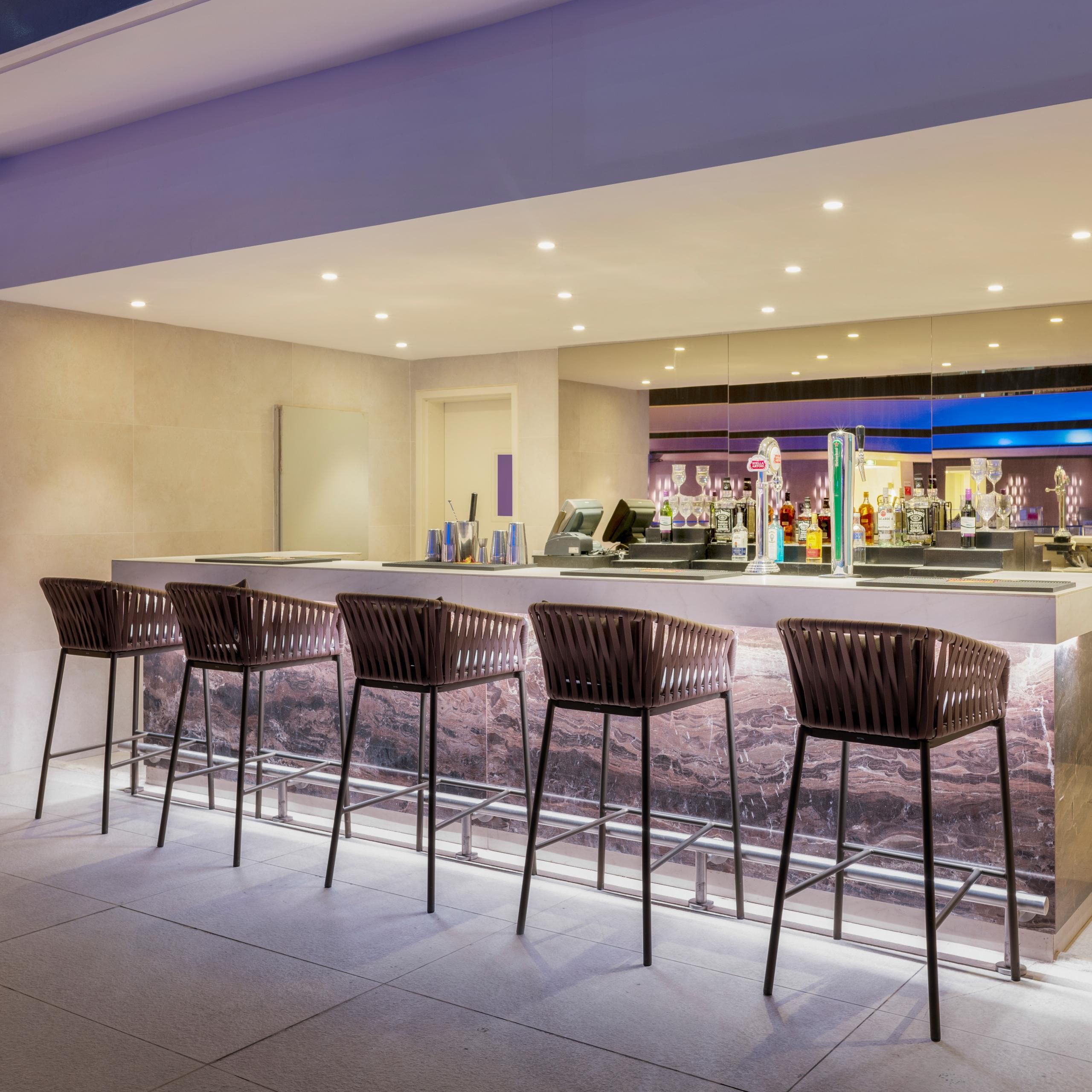 Liquidity poolside lounge has a bar and restaurant seating options