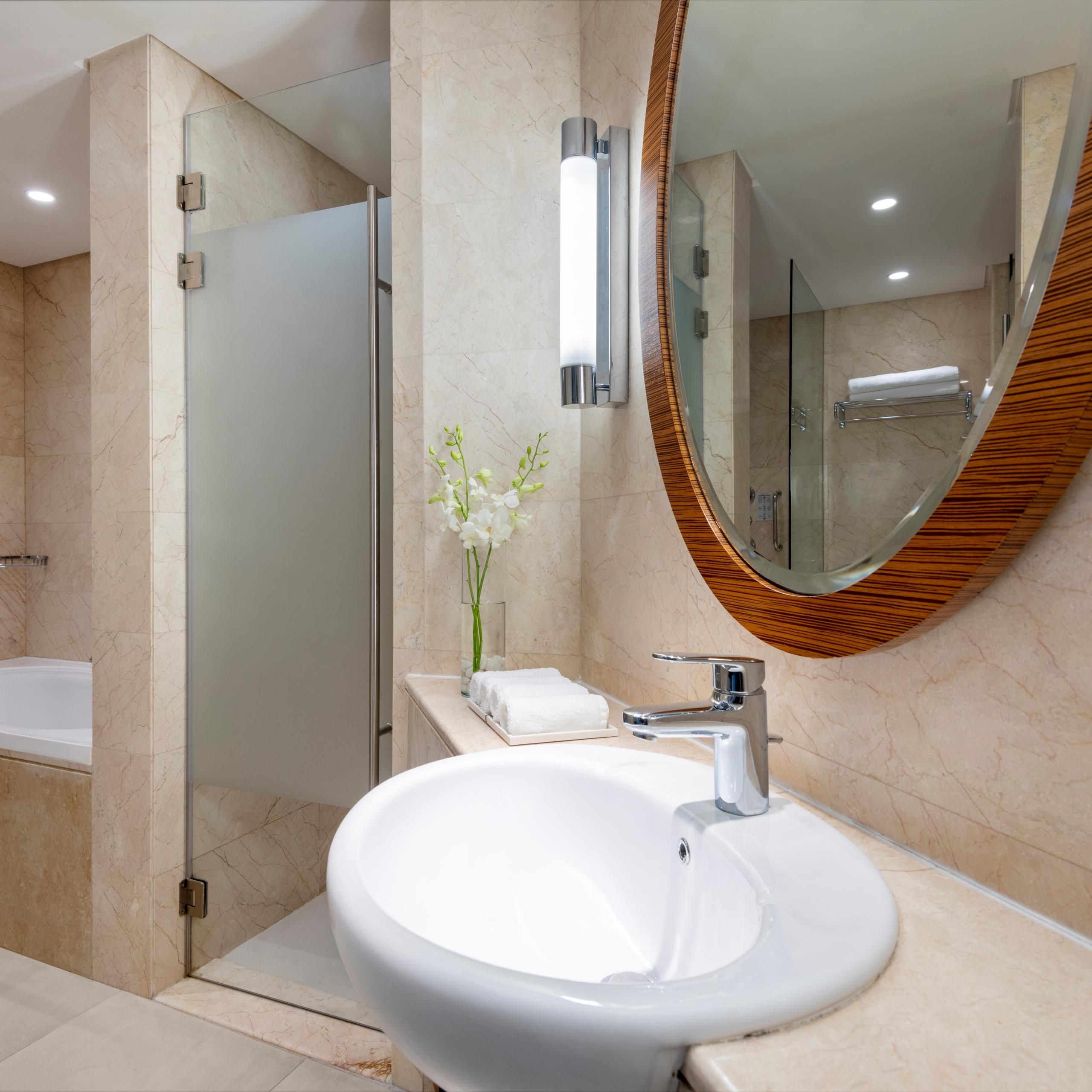 Presidential Suite bathroom features a shower room and a bathtub
