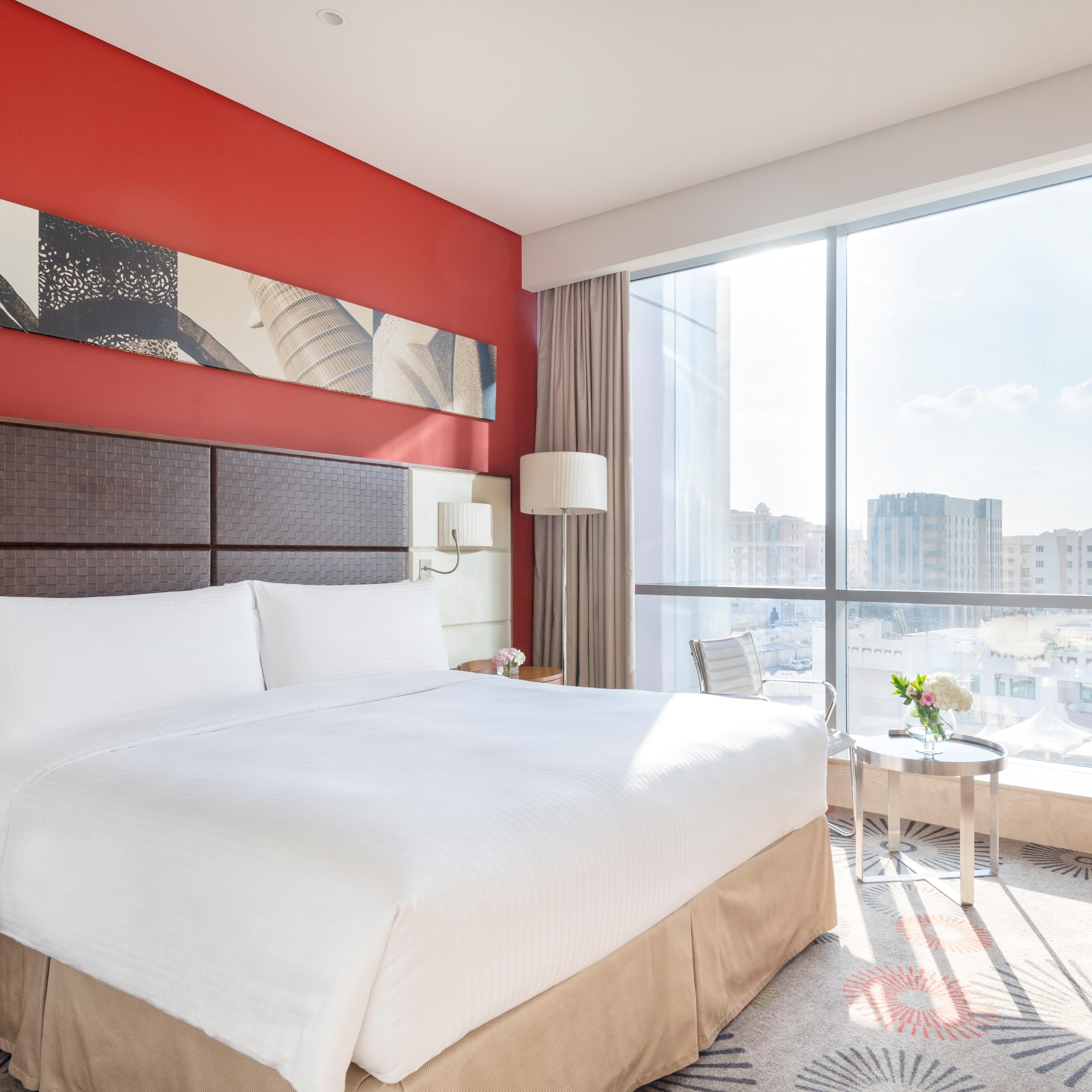 Master bedroom in Amiri Suite has a king bed and a great city view