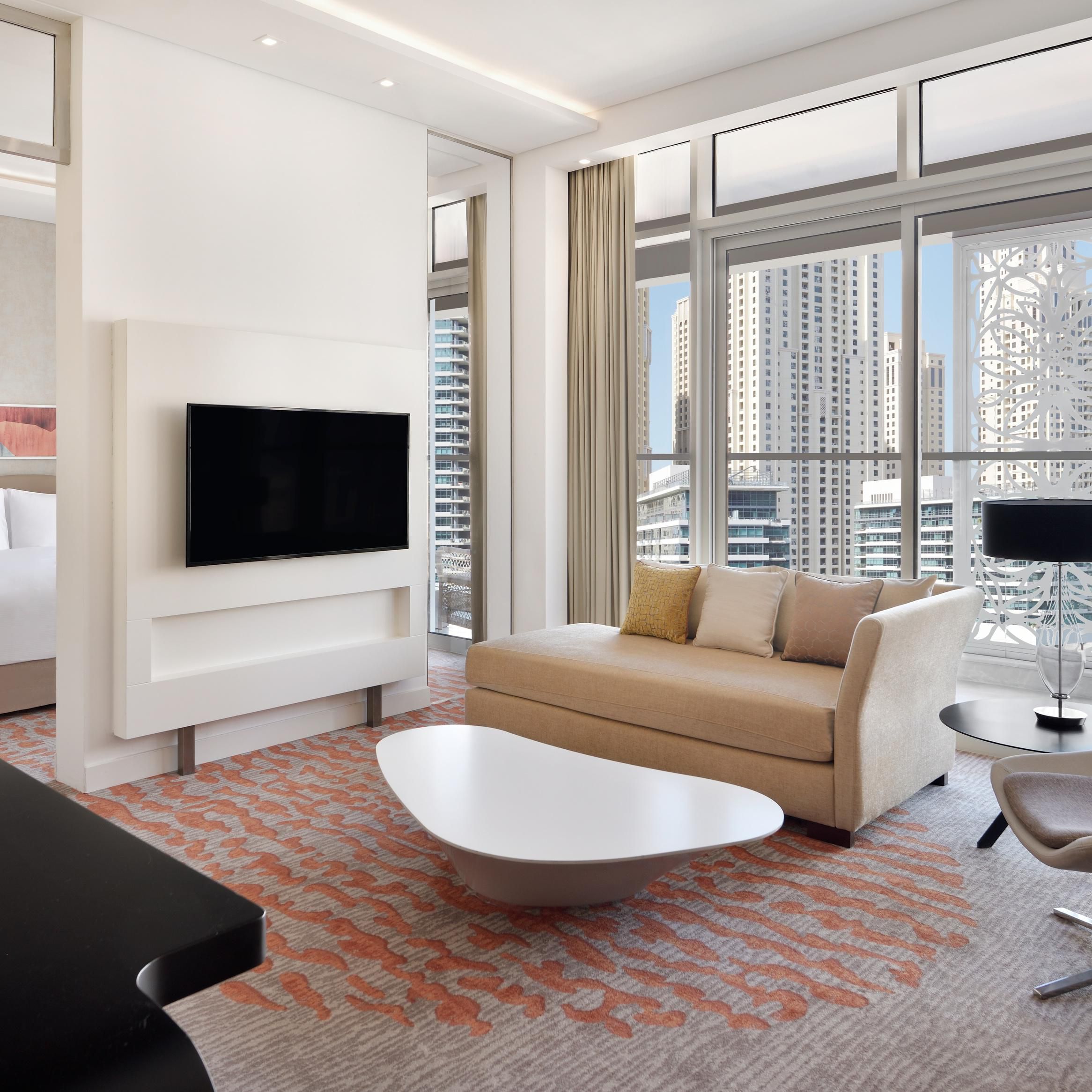 Deluxe Suite Living room with cosmopolitan Dubai Marina view