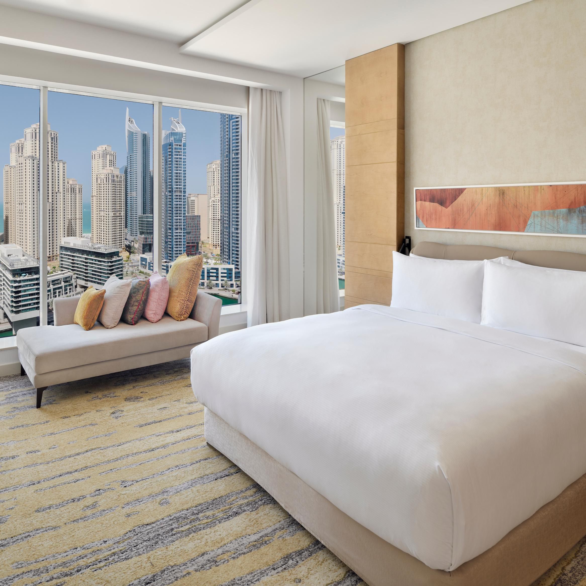 Plush bed with stunning view of Dubai Marina