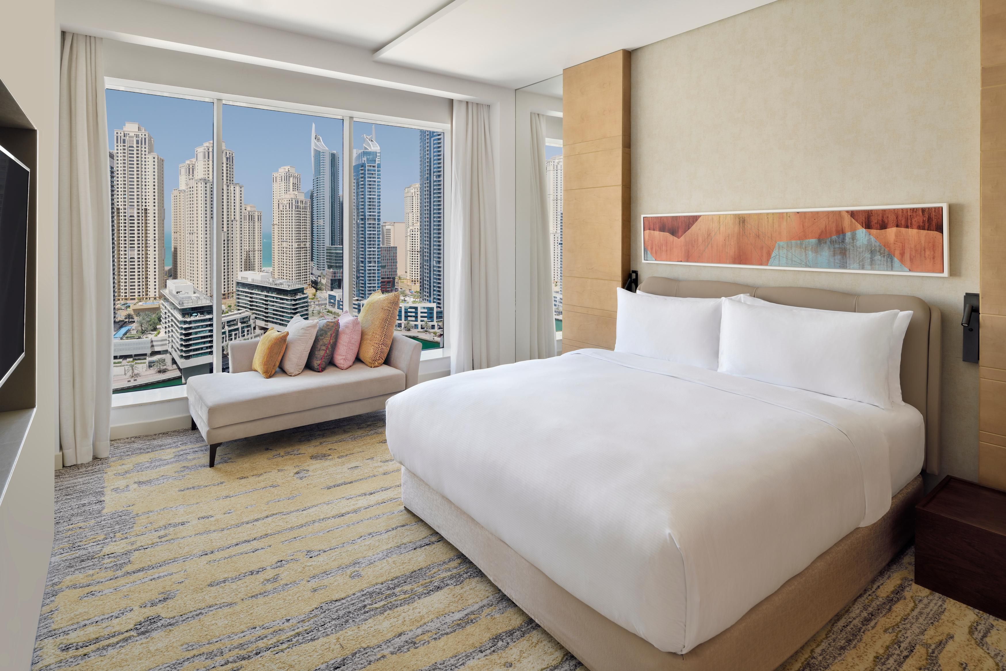 Plush bed with stunning view of Dubai Marina