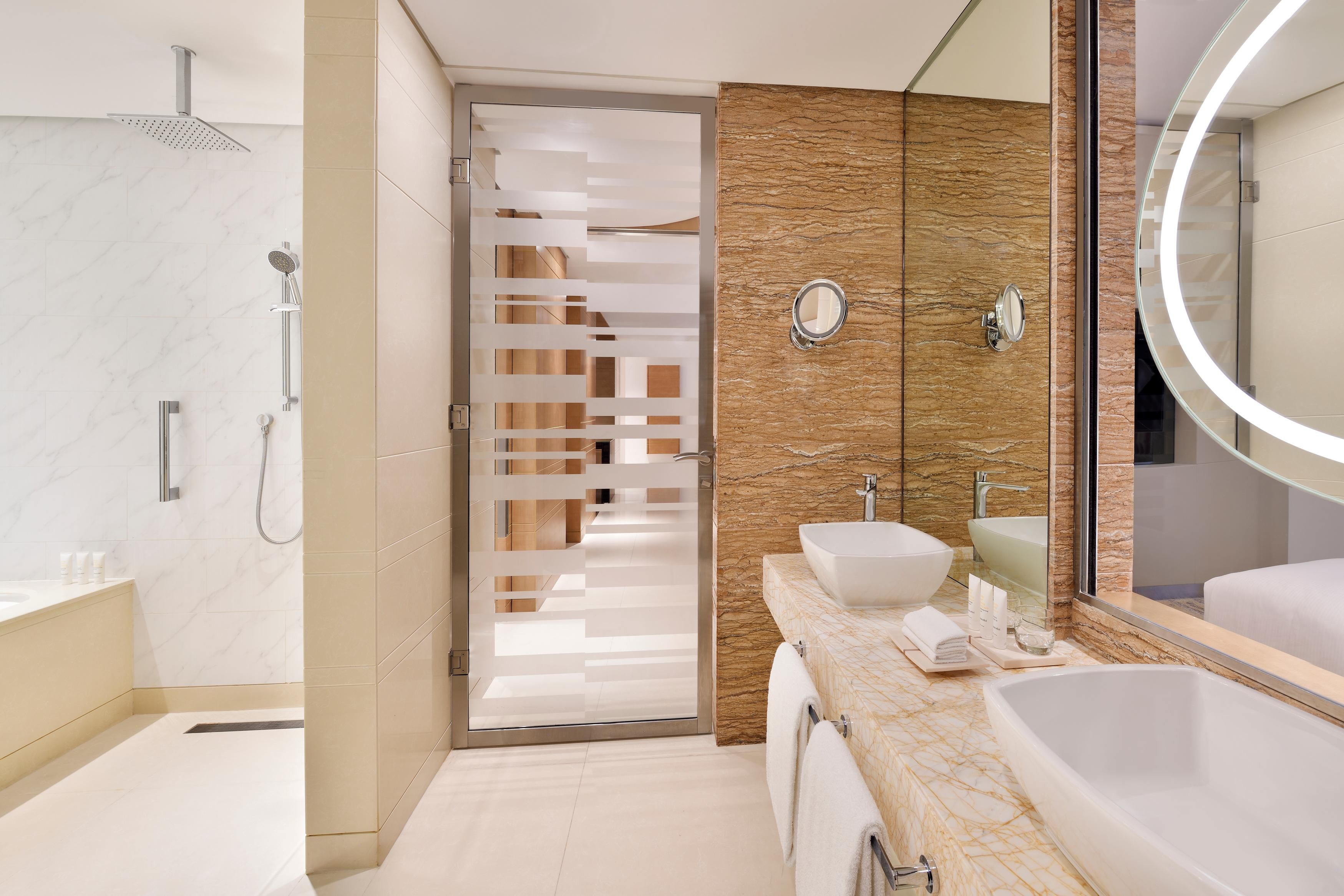 Executive Suite Bathroom with Shower and a bathtub