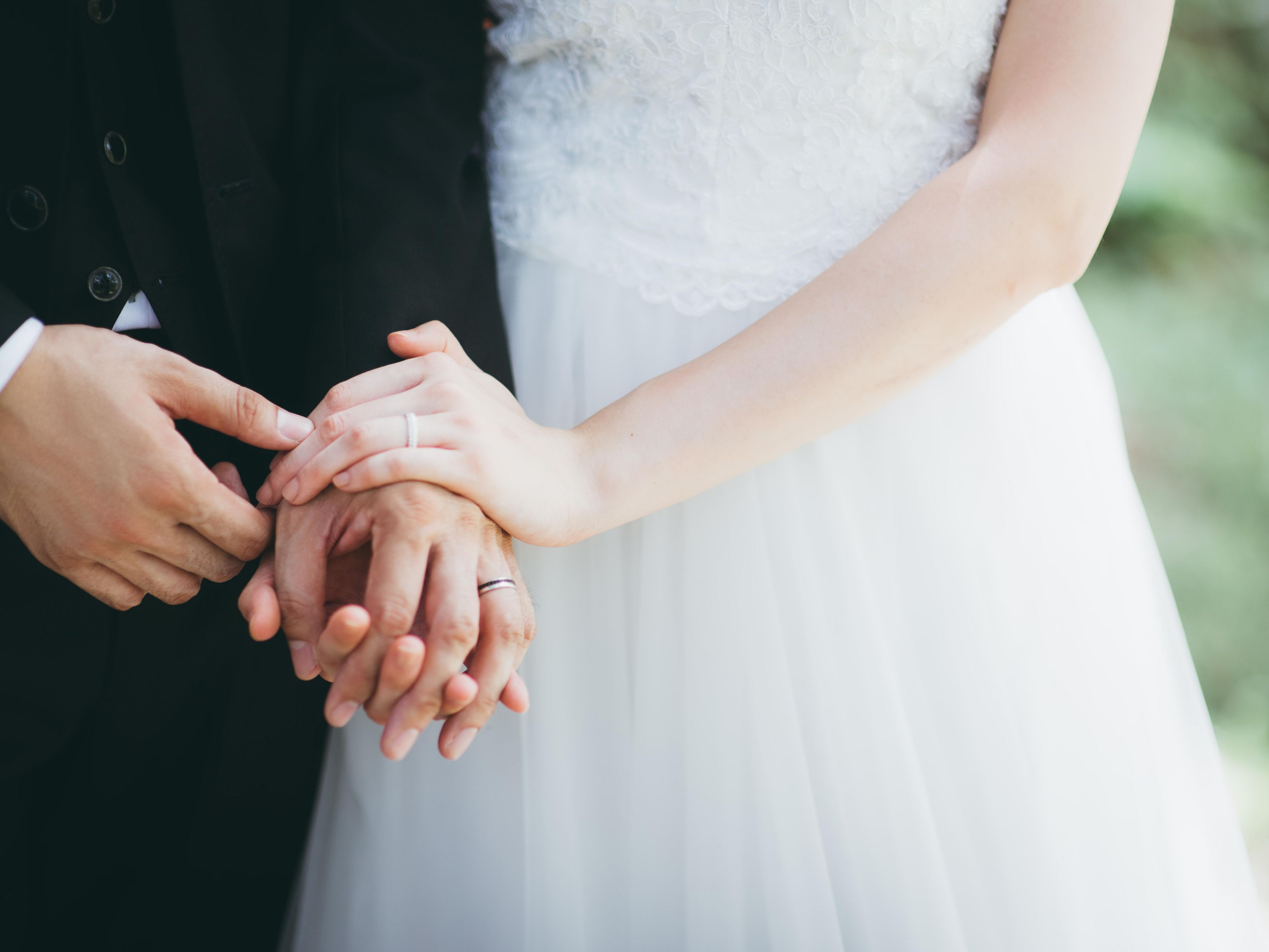 wedding couple holding hands
