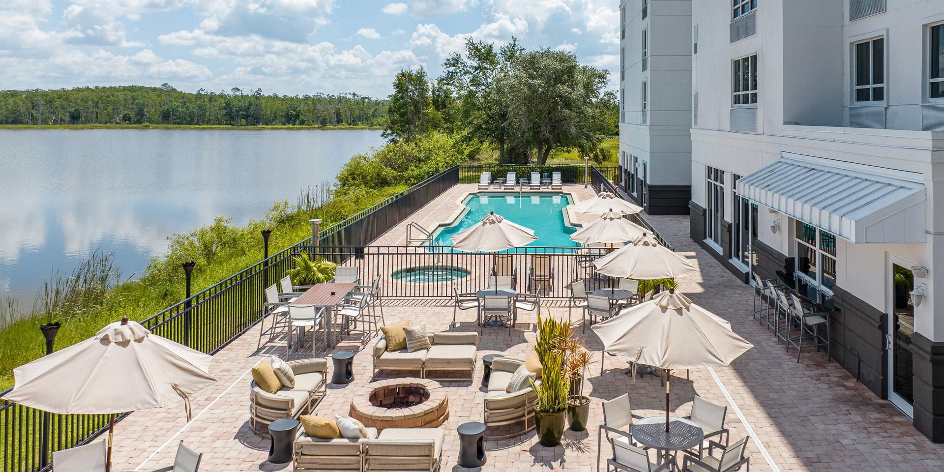 Our extensive lakefront outdoor entertainment area is the perfect place to unwind. Take a refreshing dip in the pool, relax in the Jacuzzi, or gather around the fire pit for a cozy evening. The scenic views and tranquil setting provide a delightful backdrop for relaxation and socializing, ensuring a memorable Fort Myers experience.
