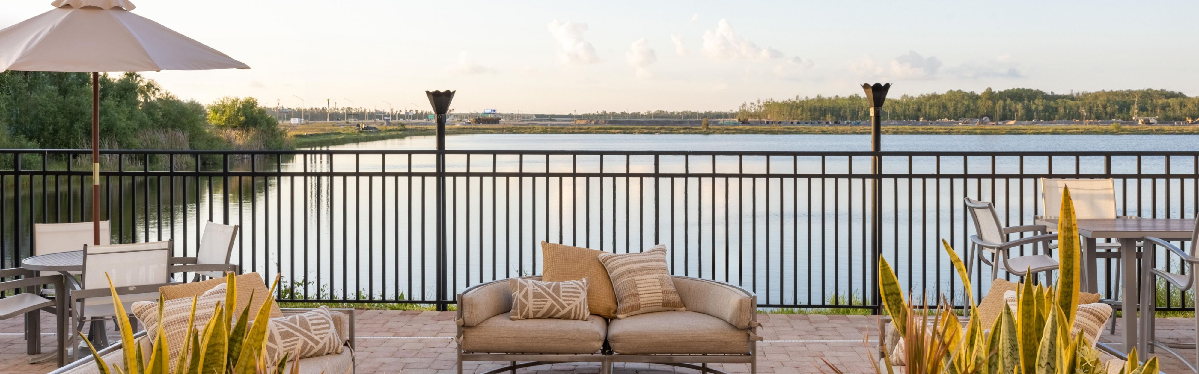Relax near our courtyard firepit and take in the view of the lake.