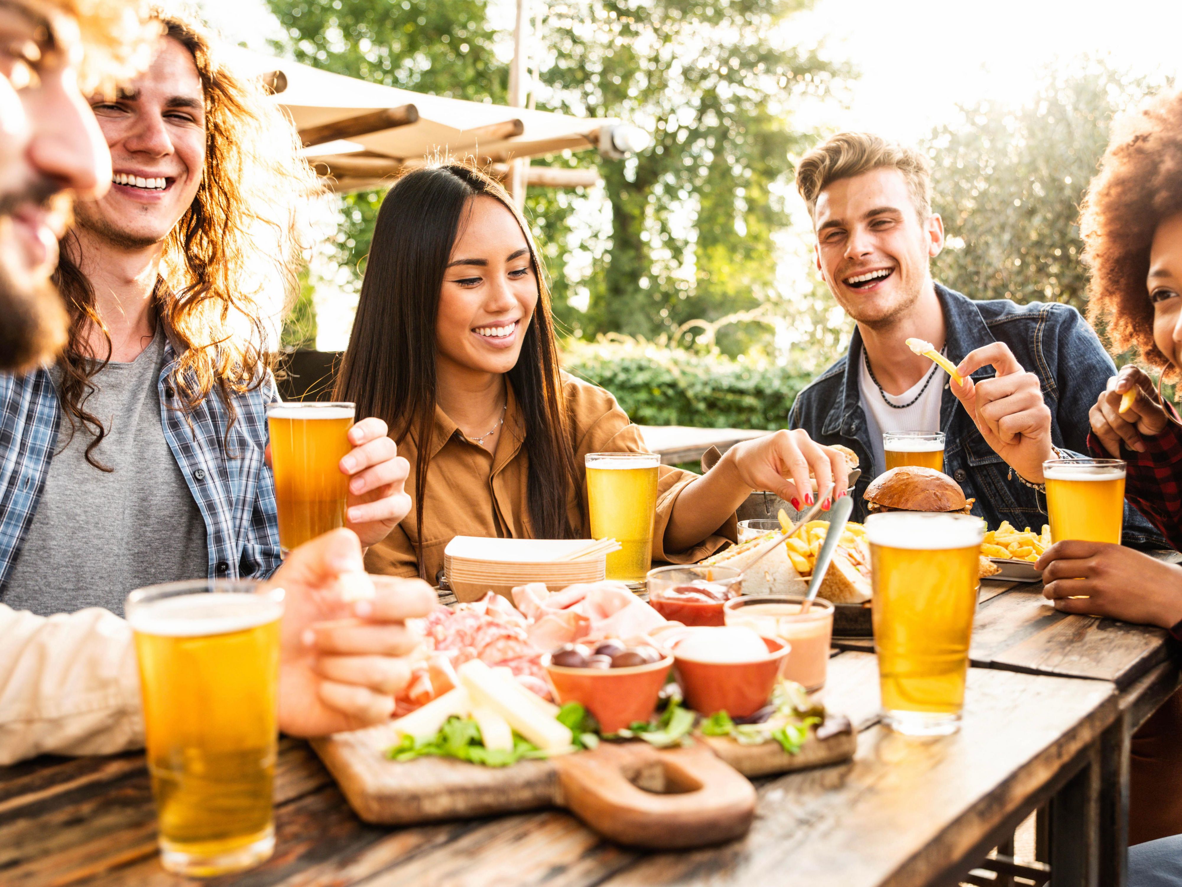 Friends toasting with beer