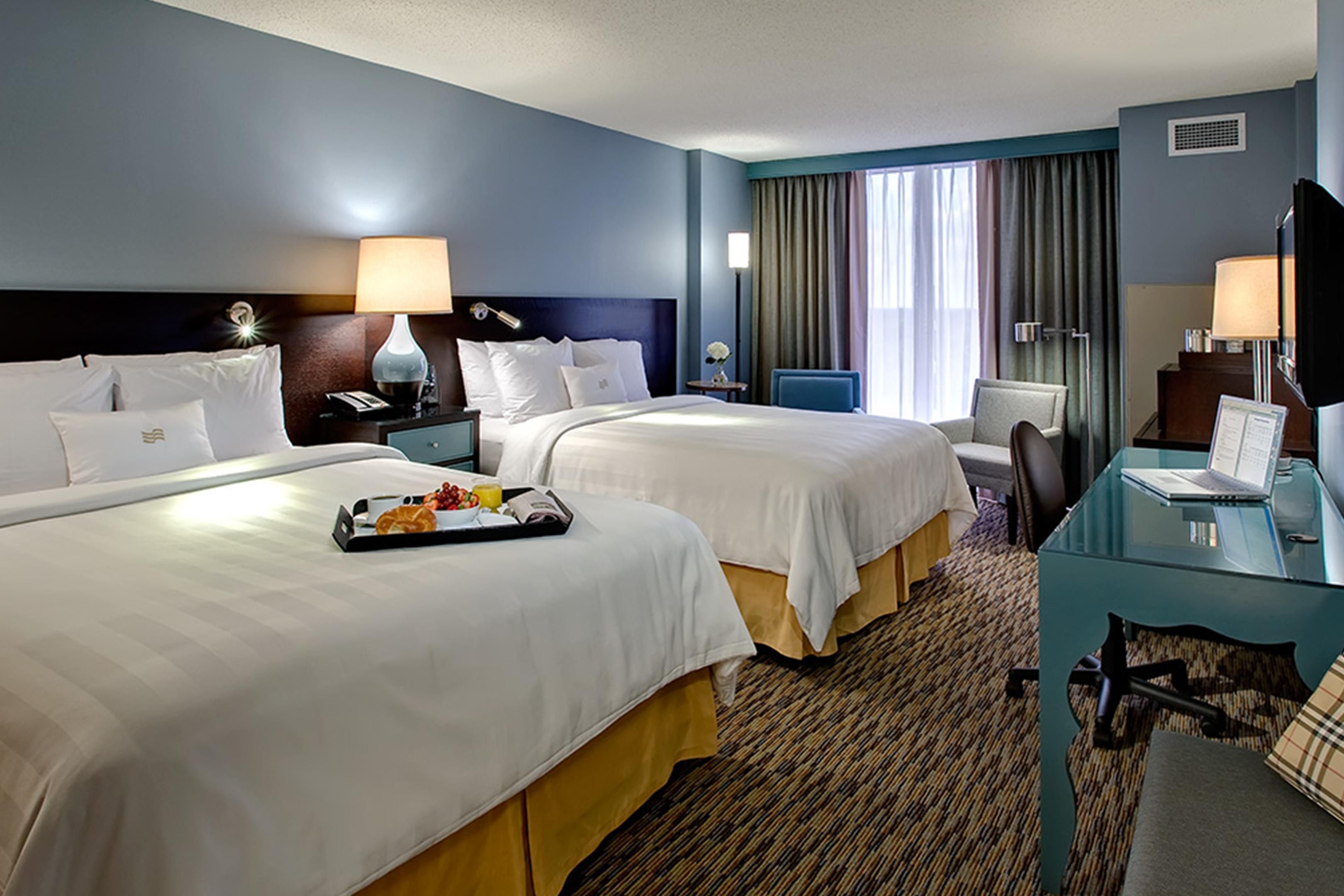 Make yourself at home in our Superior Two Queen Beds room.