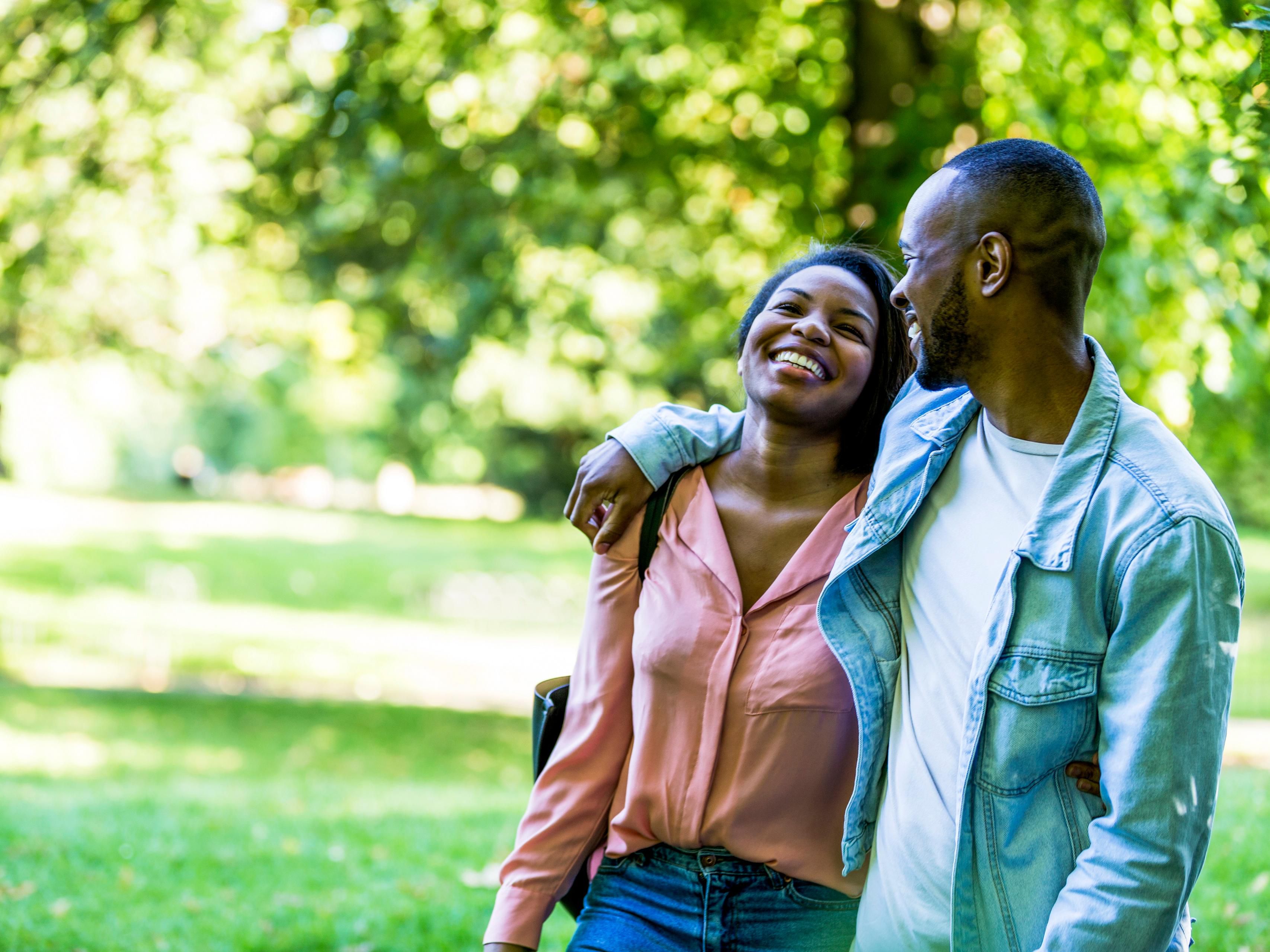 couple smiling and walking